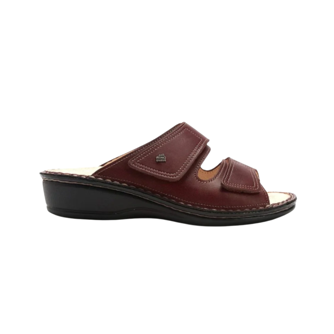 Side View of Women’s Finn Comfort Jamika-S Shoe in Brandy Brown – featuring smooth leather upper for classic style, cushioned footbed for all-day comfort, and flexible rubber outsole for natural movement.