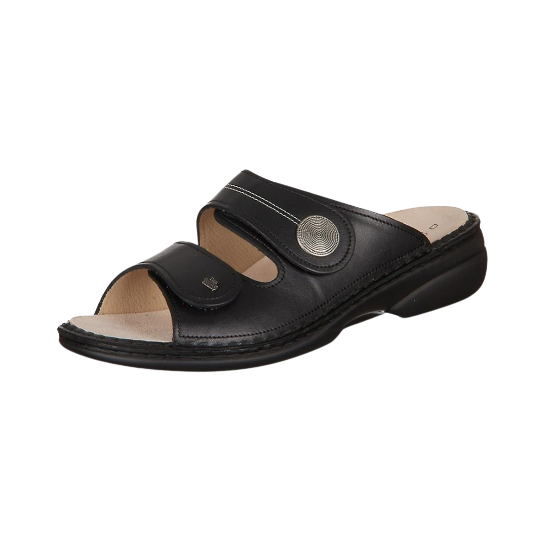 Angled View of Women’s Finn Comfort Sansibar-S Shoe in Black – featuring classic silhouette with polished leather finish, cushioned interior for all-day comfort, and sturdy sole for support.