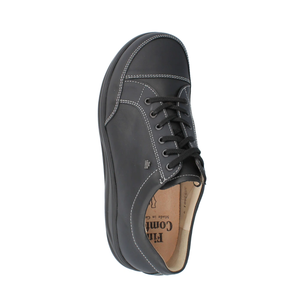 Top View of Men’s Finn Comfort Huelva Shoe in Black – featuring smooth leather upper, lace-up closure for adjustable fit, and padded collar for ankle support.