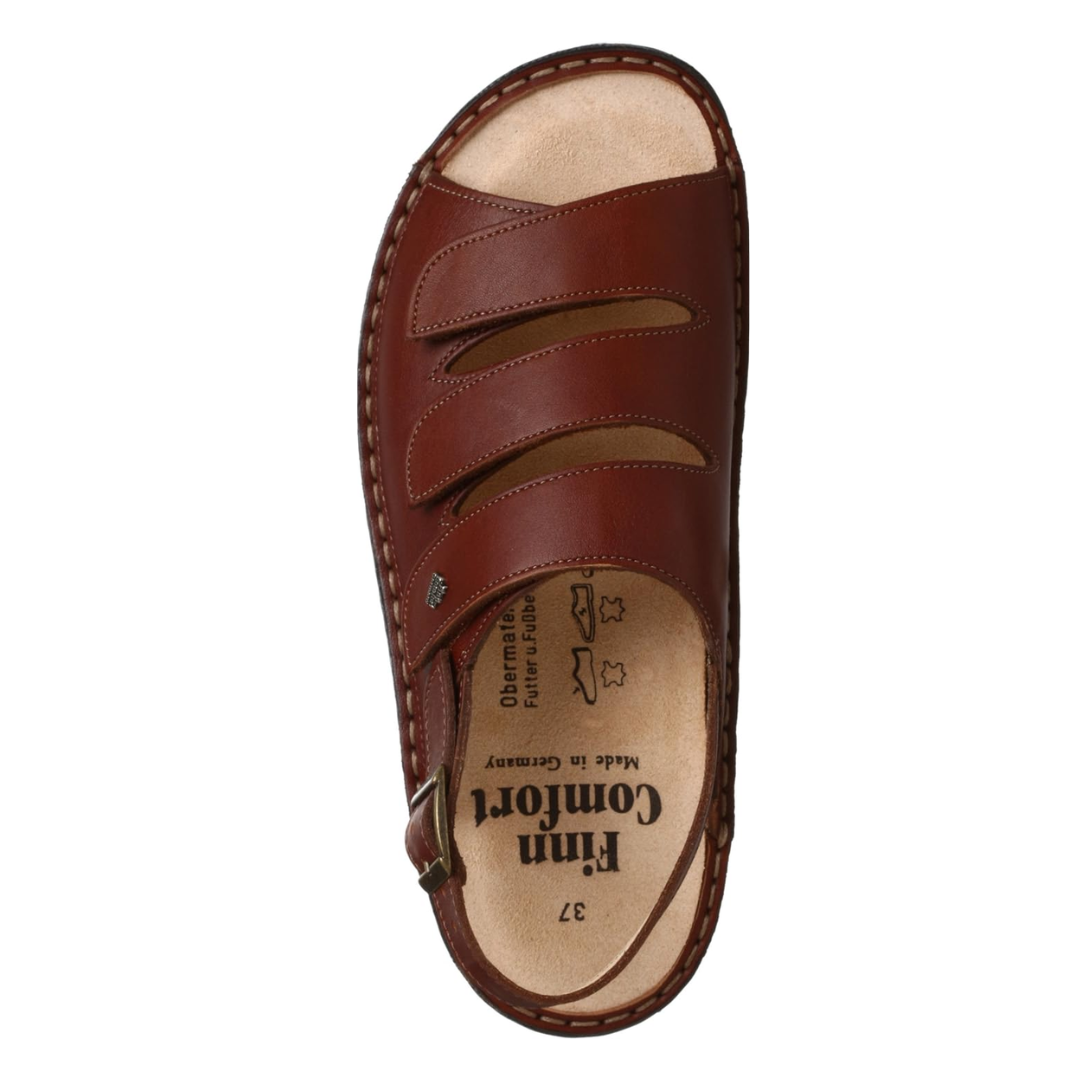 Top View of Women’s Finn Comfort Sylt sandal in Brandy leather – featuring three adjustable hook-and-loop straps across the forefoot, a soft removable cork footbed lined with suede, and a roomy toe box for enhanced comfort.