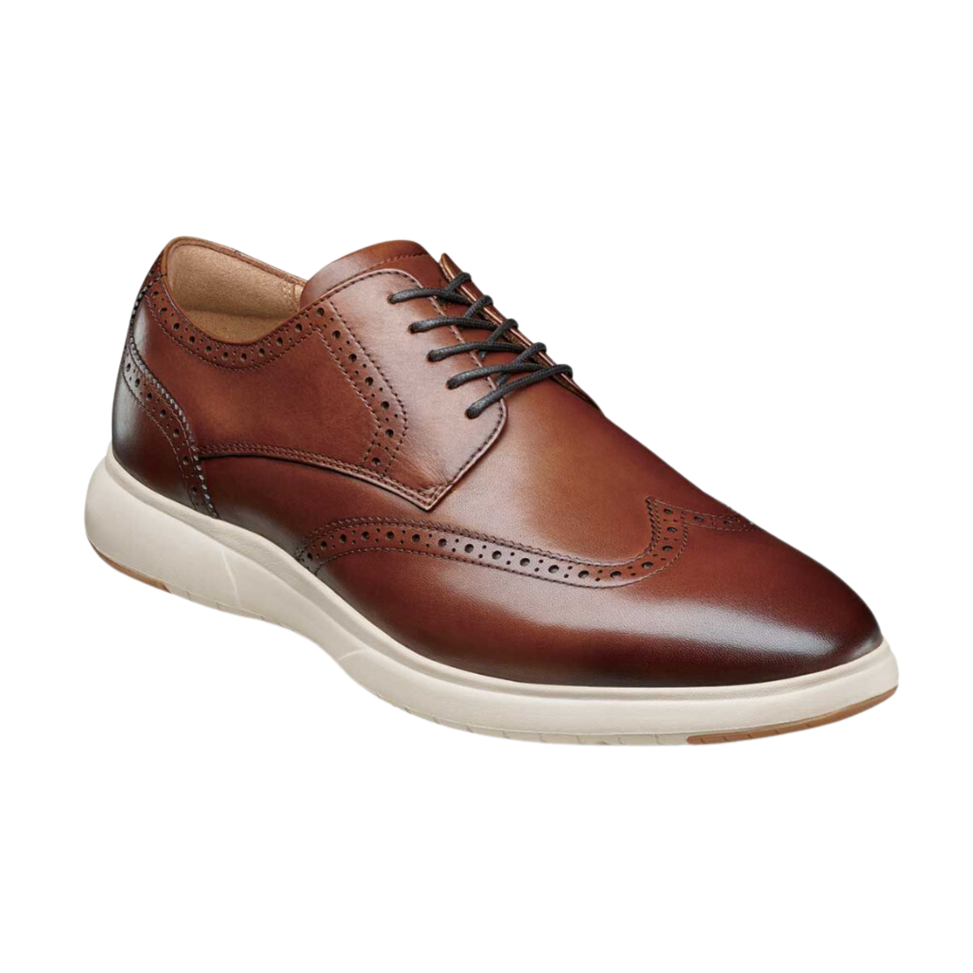 Angled view of Men’s Dash Wing Tip in Cognac – capturing the bold wingtip design, rich hand-burnished leather, and updated sole construction that fuses timeless detailing with everyday wearability.