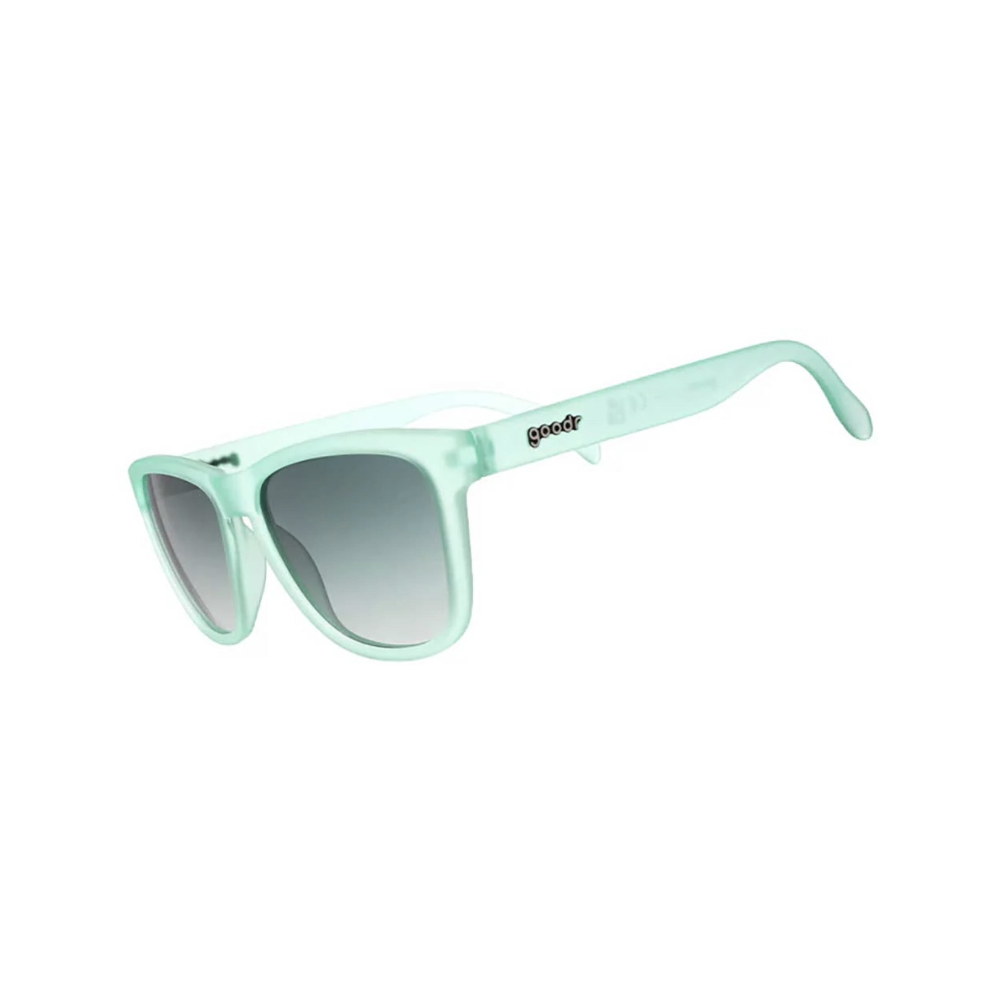 Angled view of unisex Goodr OG non-slip sunglasses in mint green – featuring gradient lenses for versatile lighting, non-slip nose pads and arms for secure fit, durable yet lightweight frame, and fresh mint green color for standout style.