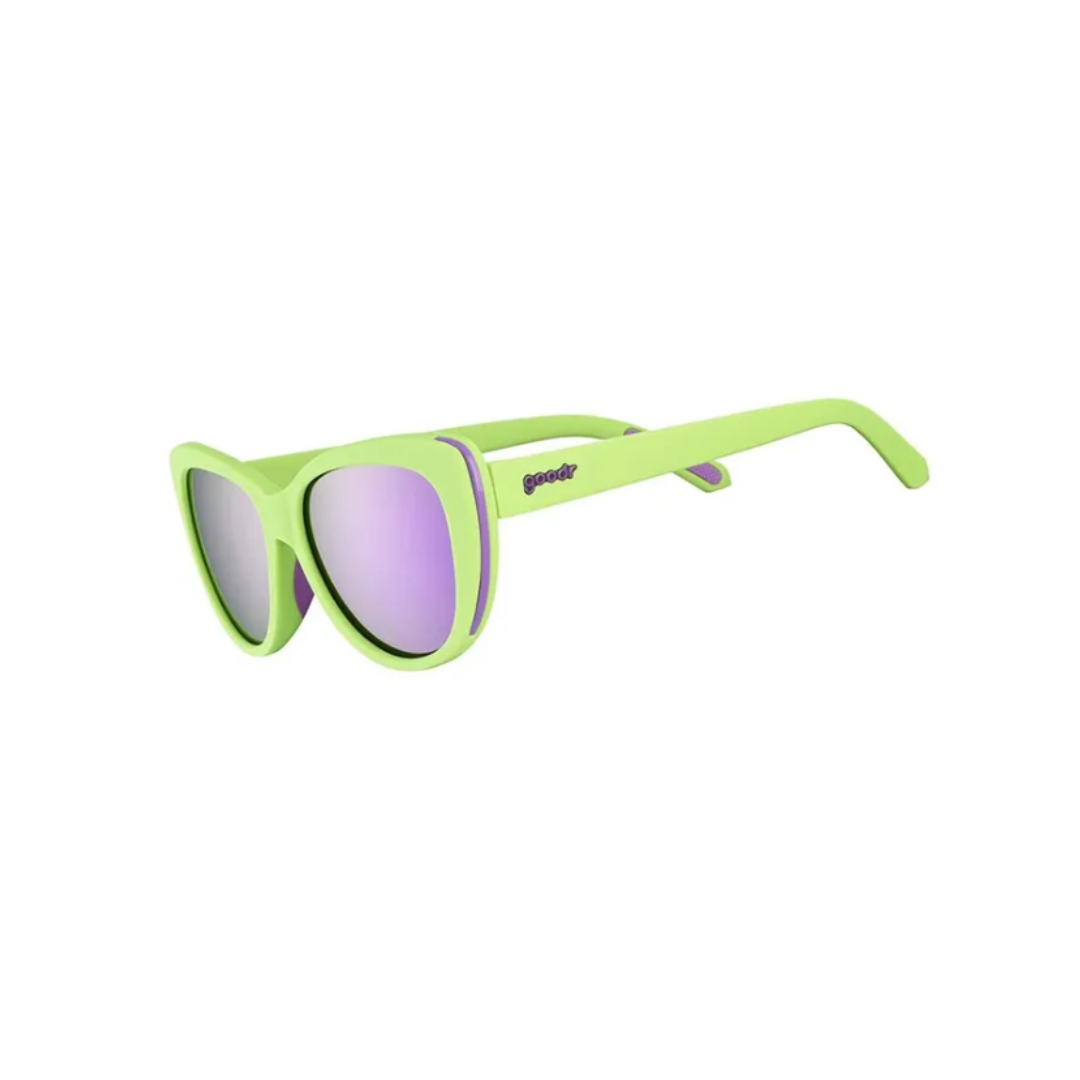 Angled View of Unisex Goodr Runways Sunglasses Total Lime Piece in Bright Lime Green Frame with Purple Mirrored Lenses – featuring chic cat-eye frame for a fashionable fit, polarized lenses for glare protection, and lightweight construction for stylish all-day wear.