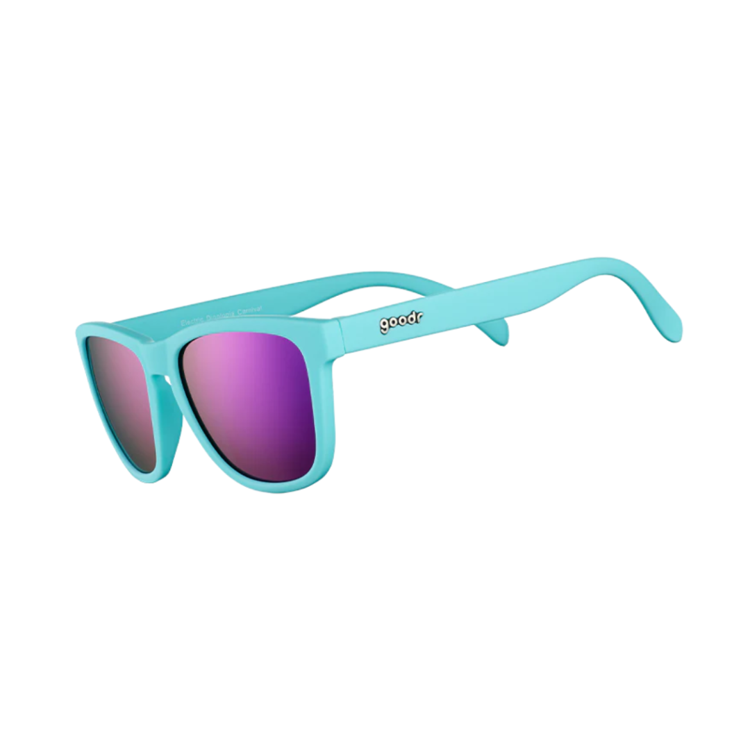 Angled View of Unisex Goodr The OG Sunglasses Electric Dinotopia Carnival in Bright Turquoise Frame with Purple Mirrored Lenses – featuring classic full-rim frame for bold style, polarized lenses for glare protection, and lightweight construction for comfortable all-day wear.
