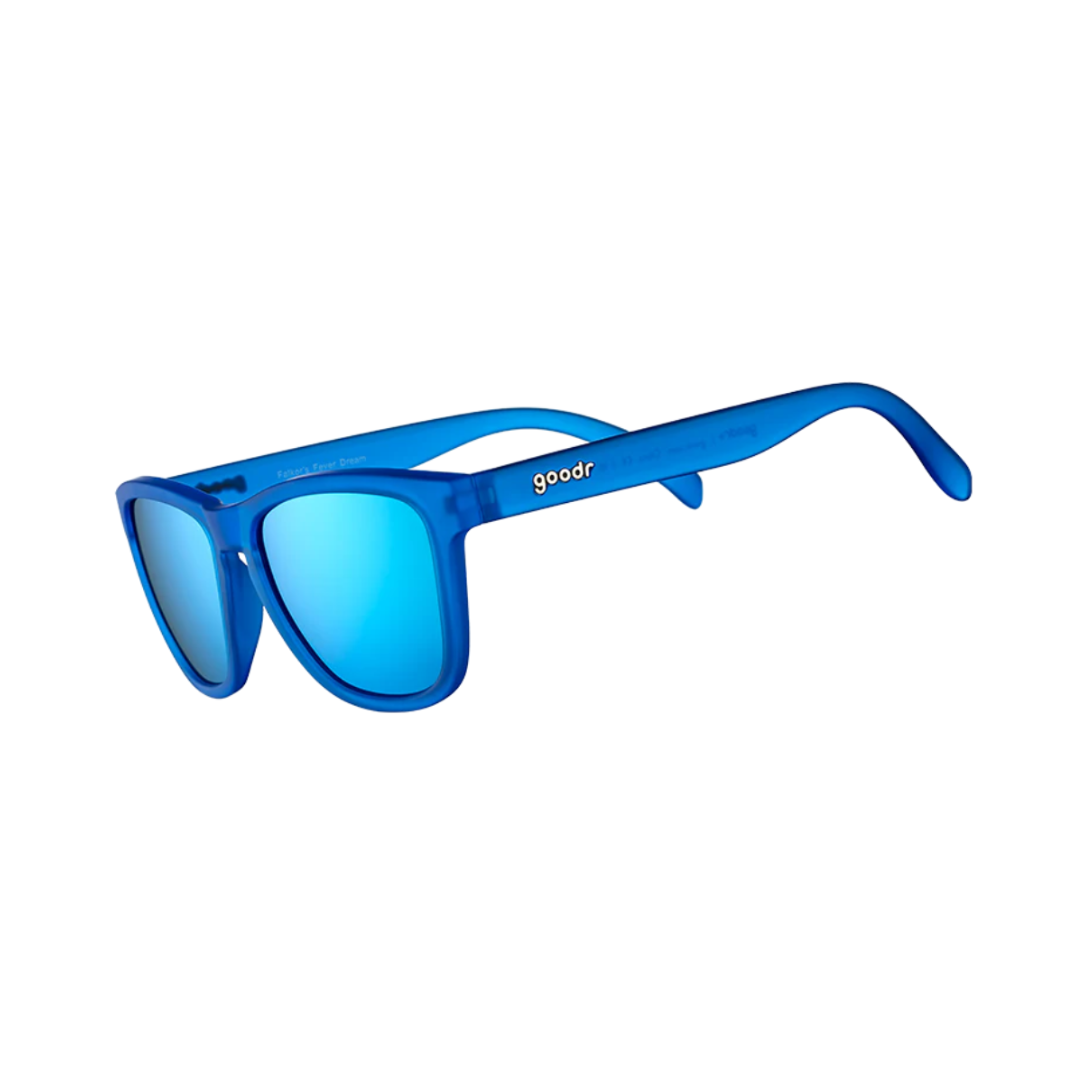 Angled View of Unisex Goodr The OG Sunglasses Falkor’s Fever Dream in Transparent Blue Frame with Blue Mirrored Lenses – featuring classic full-rim frame for vibrant style, polarized lenses for glare protection, and lightweight construction for comfortable all-day wear.