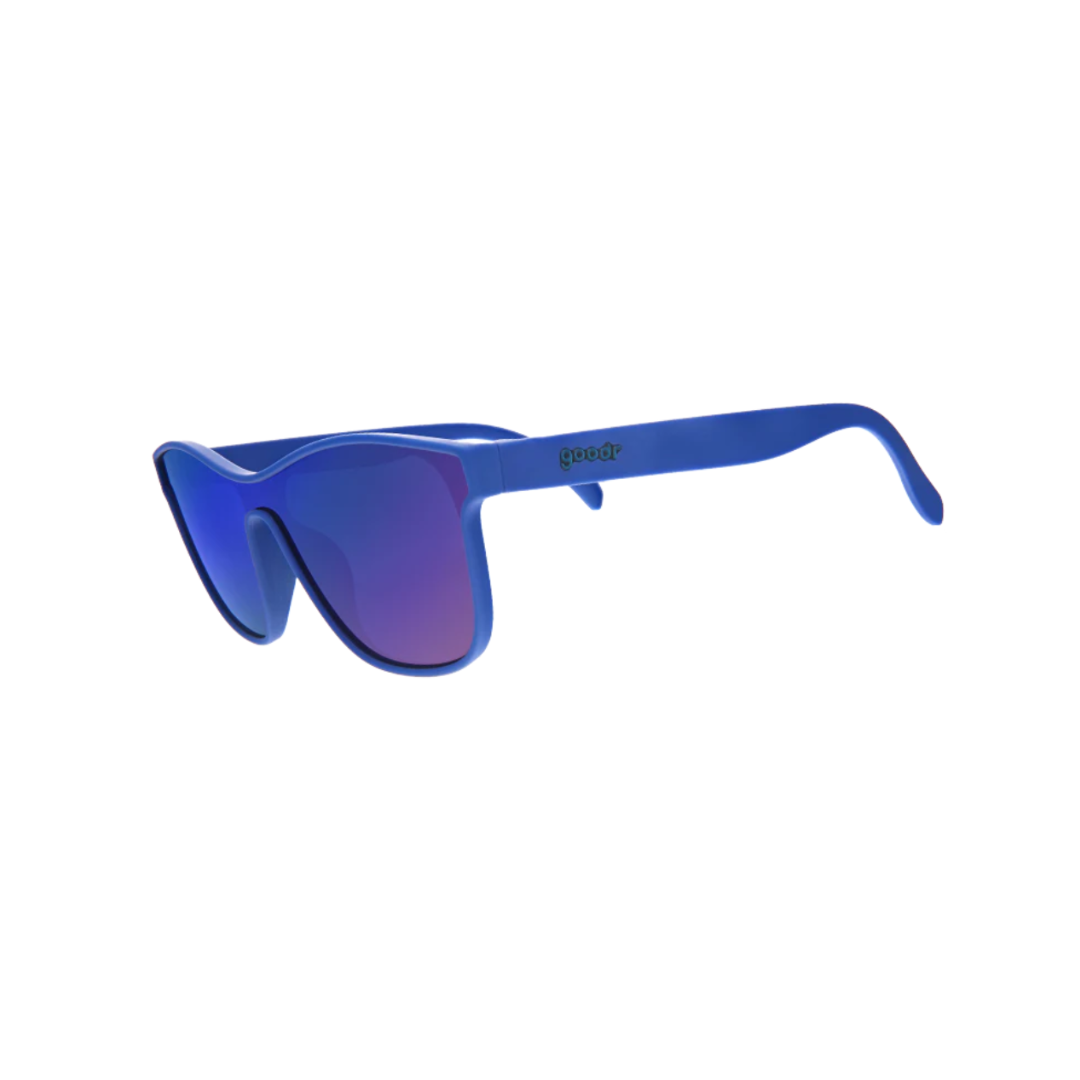 Angled View of Unisex Goodr VRG Sunglasses Best Dystopia Ever in Matte Blue Frame with Purple Mirrored Lenses – featuring futuristic wraparound frame for enhanced coverage, polarized lenses for glare reduction, and lightweight design for comfortable wear.
