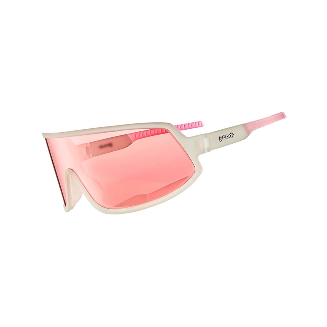 Angled view of unisex Goodr Wrap G non-slip sunglasses in pink – featuring polarized lenses, secure rubberized arms, lightweight frame, and bright pink design.