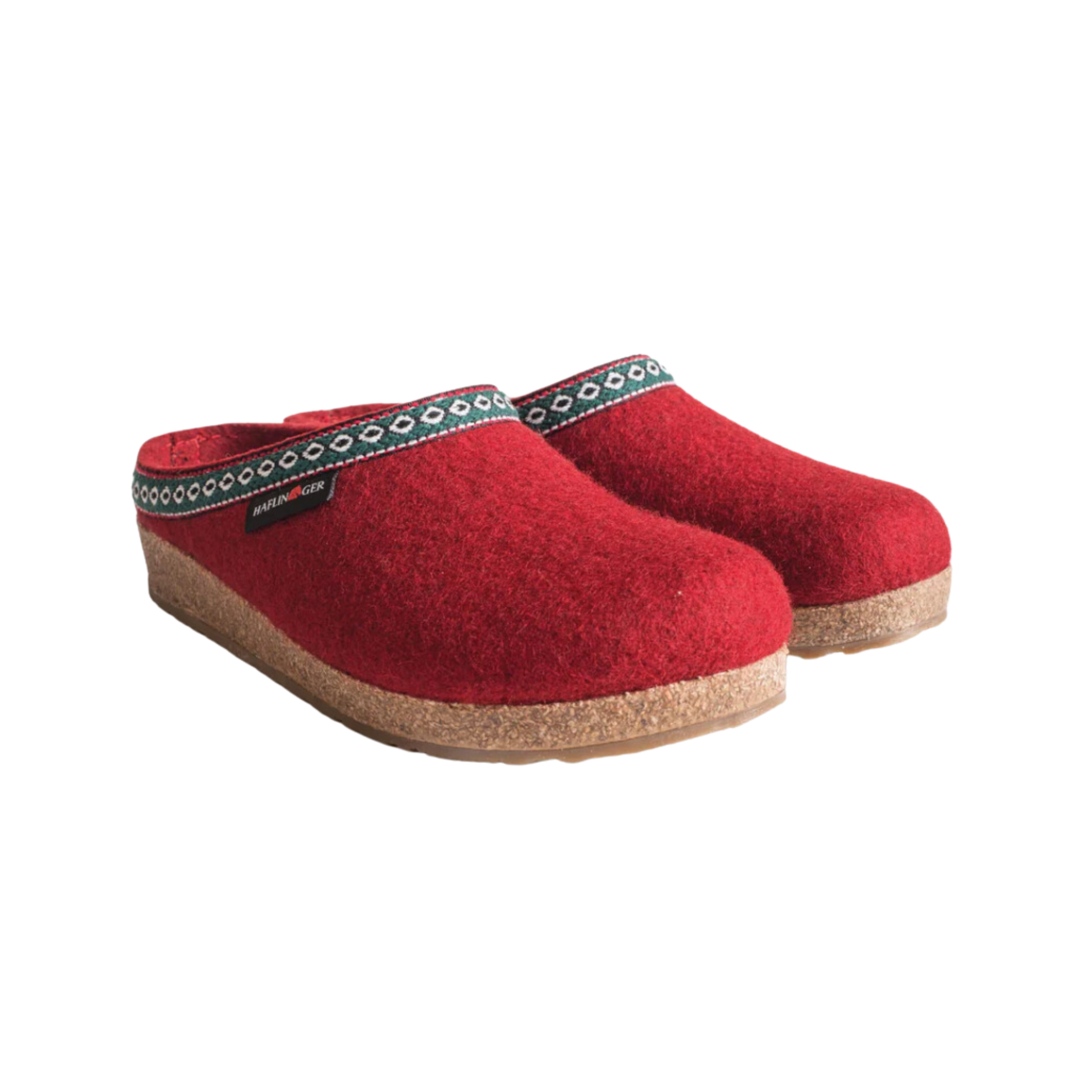 Angled view of Haflinger GZ Classic in Chili – featuring natural wool felt in a bold red hue, supportive cork-latex footbed, and durable sole designed for year-round comfort and timeless, functional style.