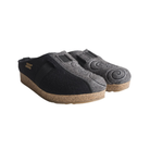 Angled view of Haflinger Women's Two-Tone Magic in Black/Grey – featuring a soft boiled wool upper in stylish dual-tone design, cushioned insole, and a sturdy indoor sole crafted for breathable warmth and timeless comfort.