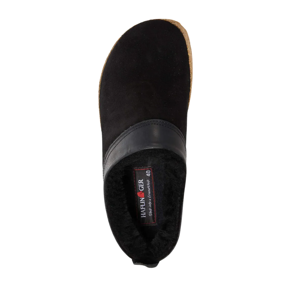 Top view of Haflinger Women's Snowbird in Black – featuring a smooth black leather upper, plush shearling lining, and a wide round toe box designed for cozy warmth and natural foot movement in cold weather.