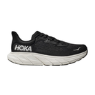 Side view of Women’s Arahi 7 running shoe in black and white – featuring engineered mesh upper for breathability, GuideRails support system to stabilize the foot and prevent overpronation, and responsive midsole cushioning for shock absorption.