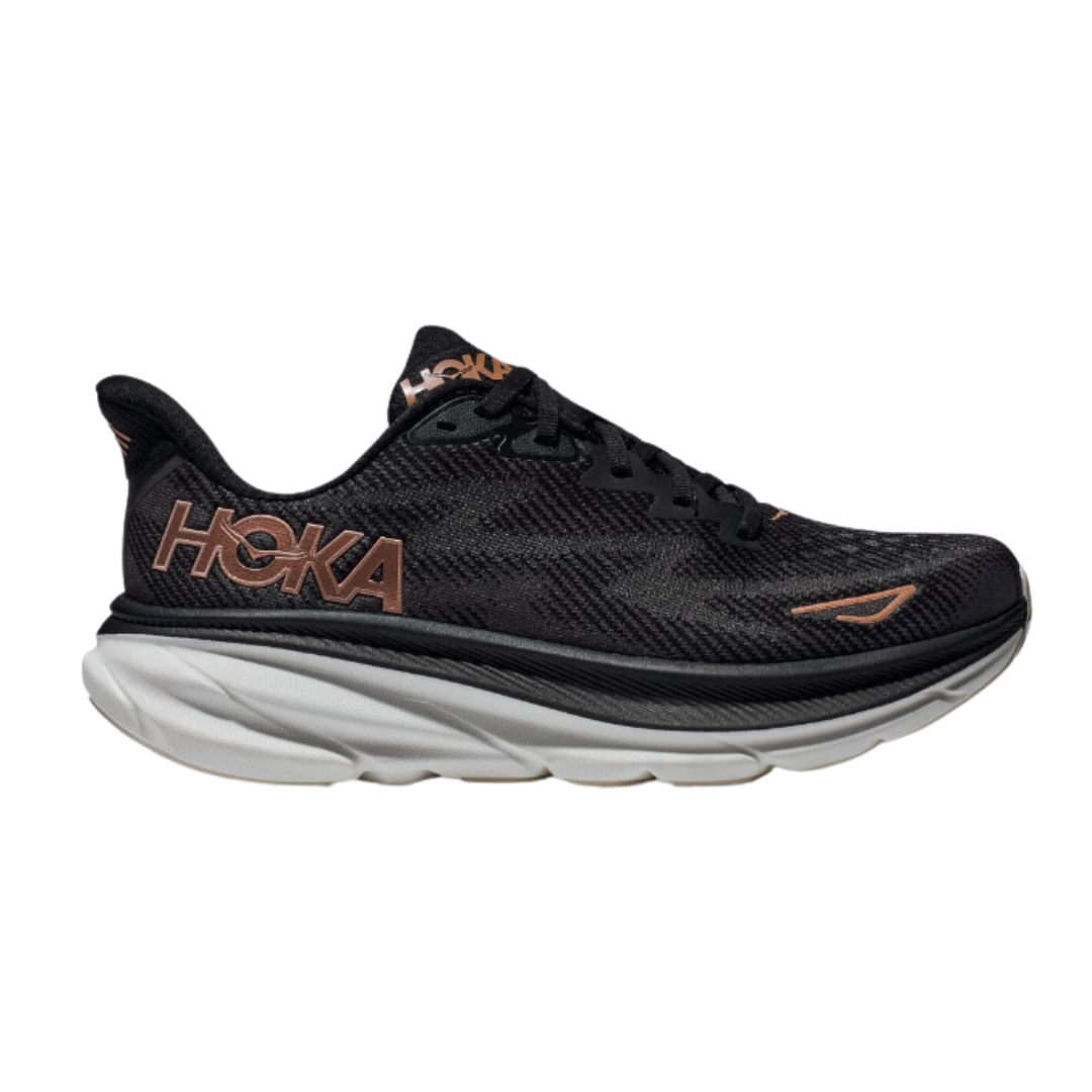 Side view of Women’s Clifton 9 running shoe in black and rose gold – featuring engineered mesh upper for breathability, DNA LOFT cushioning for soft, responsive ride, and sleek silhouette designed for lightweight performance.