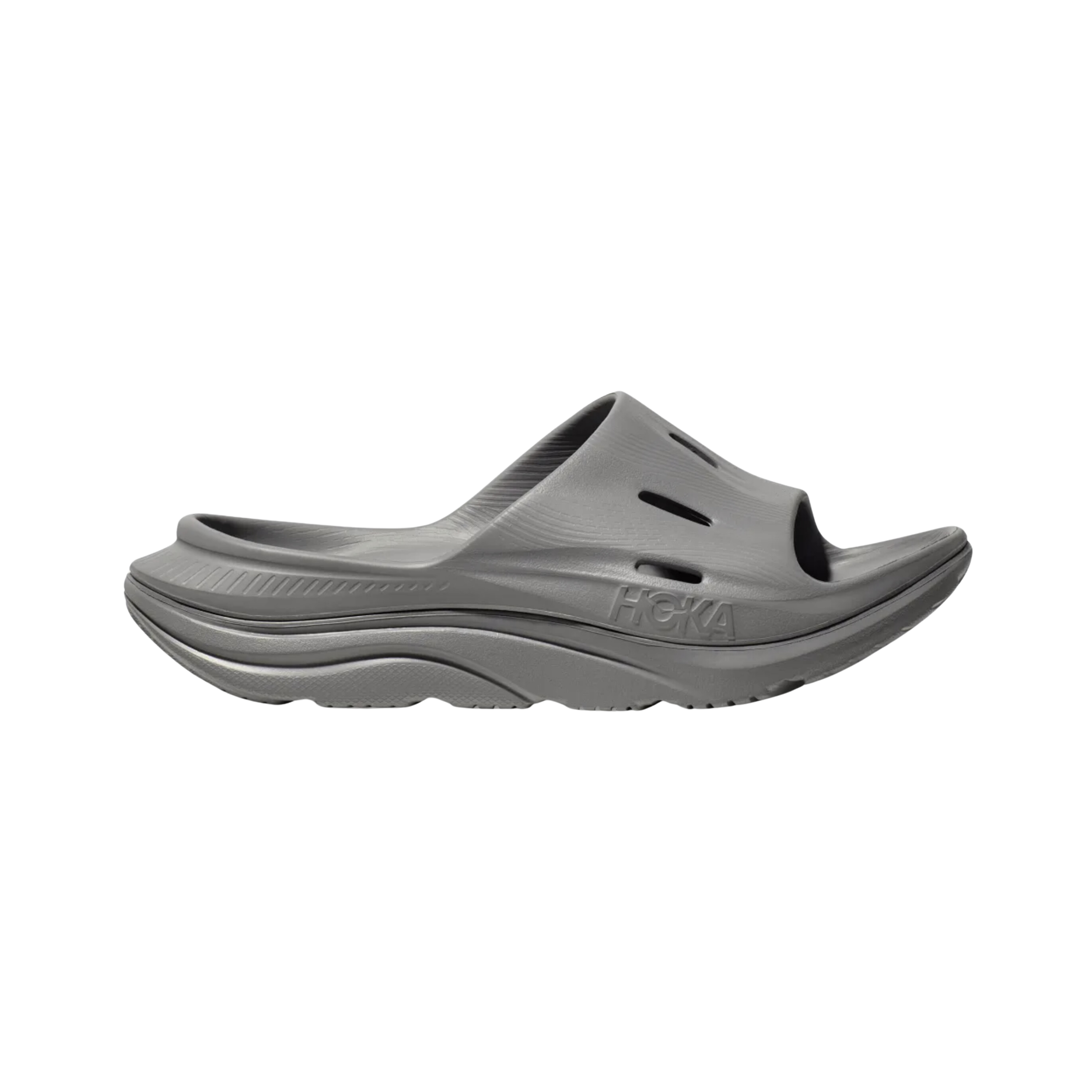 Side view of Unisex Ora Recovery Slide 3 in grey – featuring a soft, lightweight EVA foam upper for easy wear, contoured footbed designed to support foot arches and reduce plantar fasciitis pain, and cushioned midsole for shock absorption and all-day comfort.