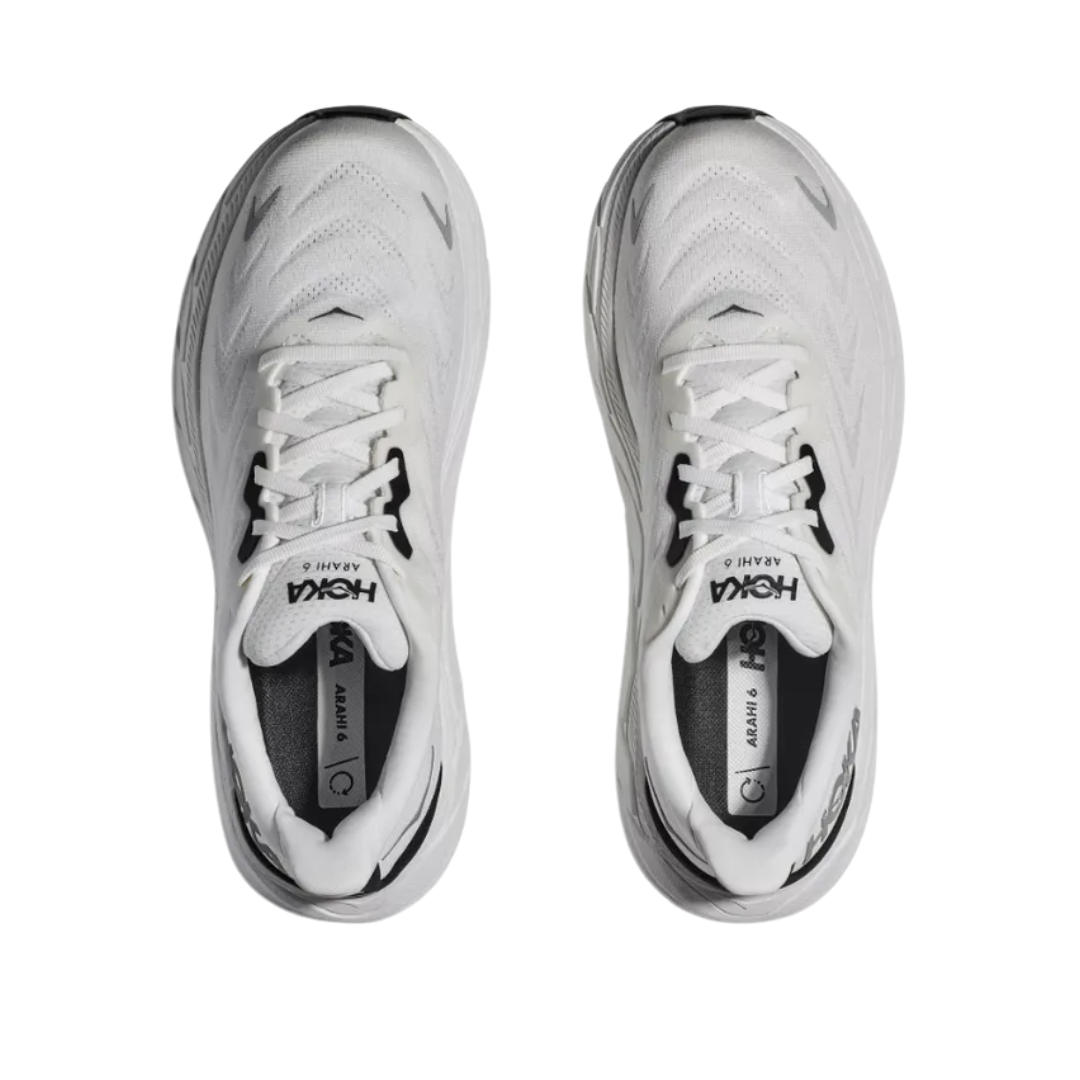 Top view of Men’s Arahi 6 running shoe in blanc de blanc and steel wool – featuring padded tongue and collar for comfort, moisture-wicking lining to keep feet dry, and secure lace-up closure for locked-in fit.