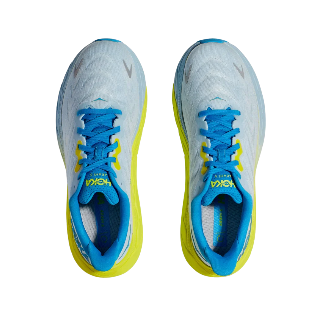 Top view of Men’s Arahi 6 running shoe in ice water and primrose – featuring padded tongue and collar for comfort, moisture-wicking lining to keep feet dry, and secure lace-up closure for locked-in fit.
