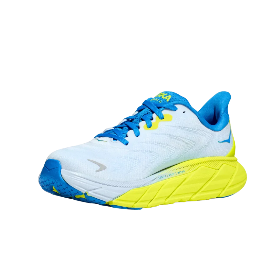 Angled view of Men’s Arahi 6 running shoe in ice water and primrose – featuring breathable mesh panels for ventilation, supportive midsole with medial post for stability, and sleek silhouette optimized for running efficiency.