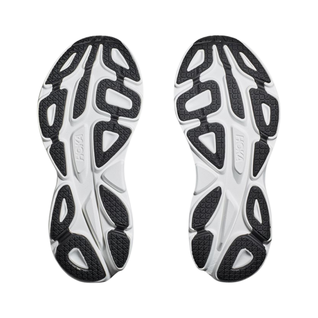 Bottom view of Bondi 8 running shoe in black and white – featuring durable rubber outsole with segmented crash pad for smooth heel-to-toe transitions, flex grooves for natural foot movement, and multi-surface traction for reliable grip.