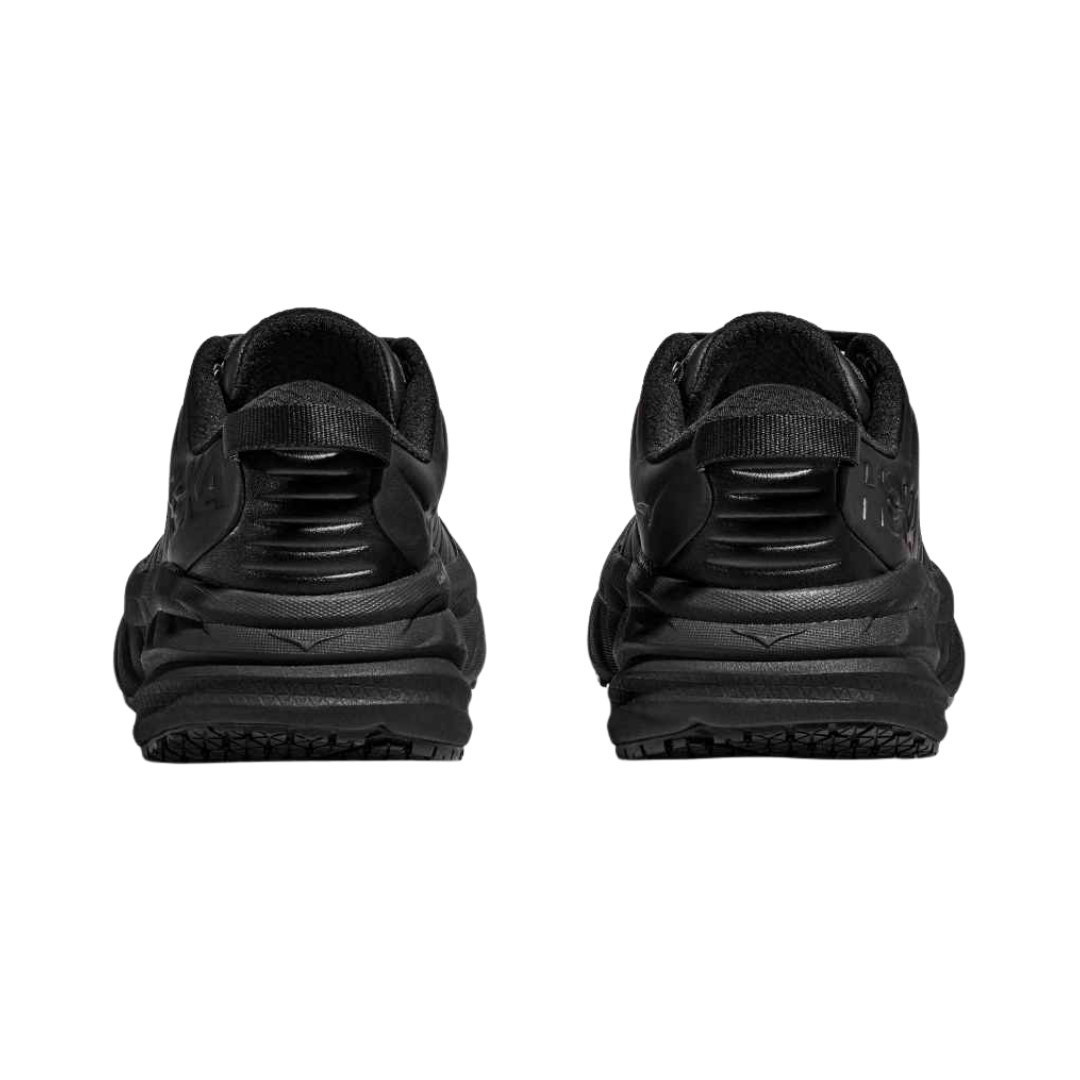 Back View of Men’s HOKA Bondi SR Walking Shoe in Black – featuring structured heel counter for rearfoot support, pull tab for easy on/off, and all-black design for a polished, uniform-ready look.