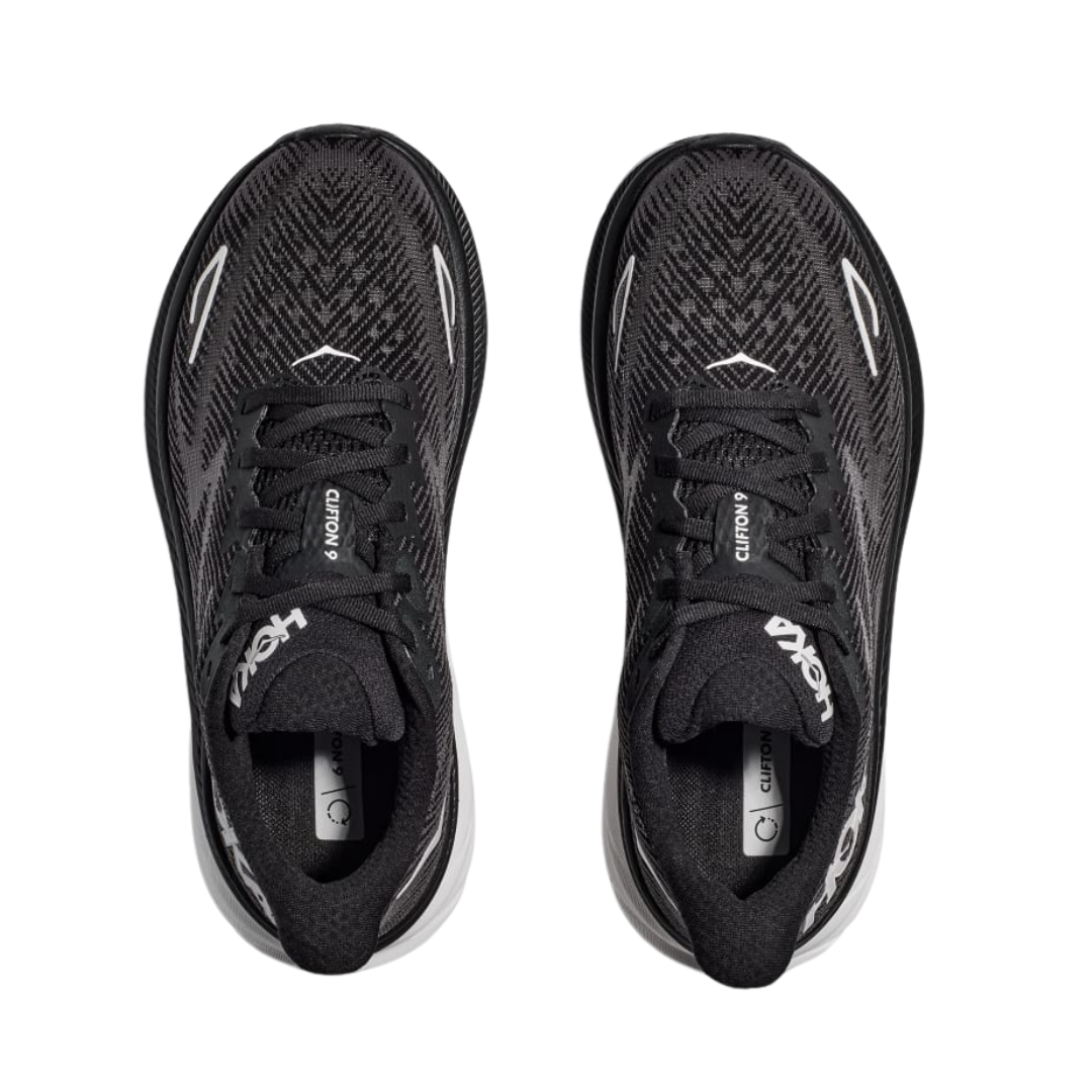 Top view of Men’s Clifton 9 running shoe in black and white – featuring padded tongue and collar for comfort, moisture-wicking lining to keep feet dry, and traditional lace-up closure for secure fit.