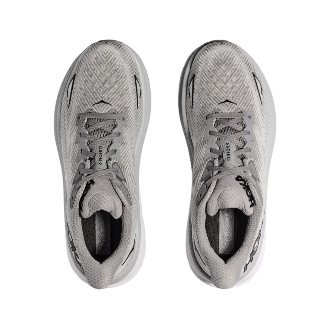 Top view of Men’s Clifton 9 running shoe in harbor mist and black – featuring padded tongue and collar for comfort, moisture-wicking lining to keep feet dry, and traditional lace-up closure for secure fit.