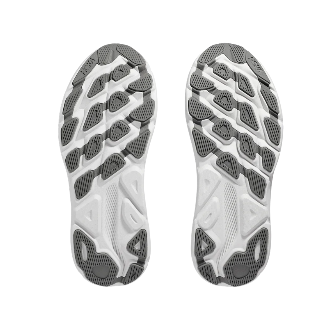 Bottom view of Men’s Clifton 9 running shoe in harbor mist and black – featuring durable rubber outsole with flex grooves for natural foot movement, segmented crash pad for smooth heel-to-toe transitions, and multi-surface traction for reliable grip.