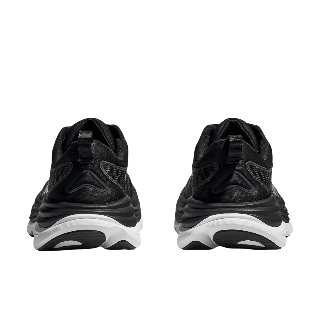 Back view of Men’s Gaviota 5 running shoe in black and white – featuring molded heel counter for rearfoot stability, pull tab for easy on and off, and subtle branding details.