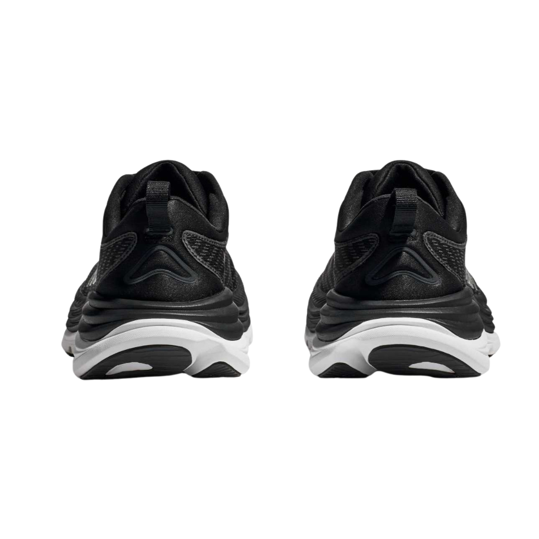 Back view of Women’s Gaviota 5 running shoe in black and white – featuring molded heel counter for rearfoot stability, pull tab for easy on and off, and subtle branding details.