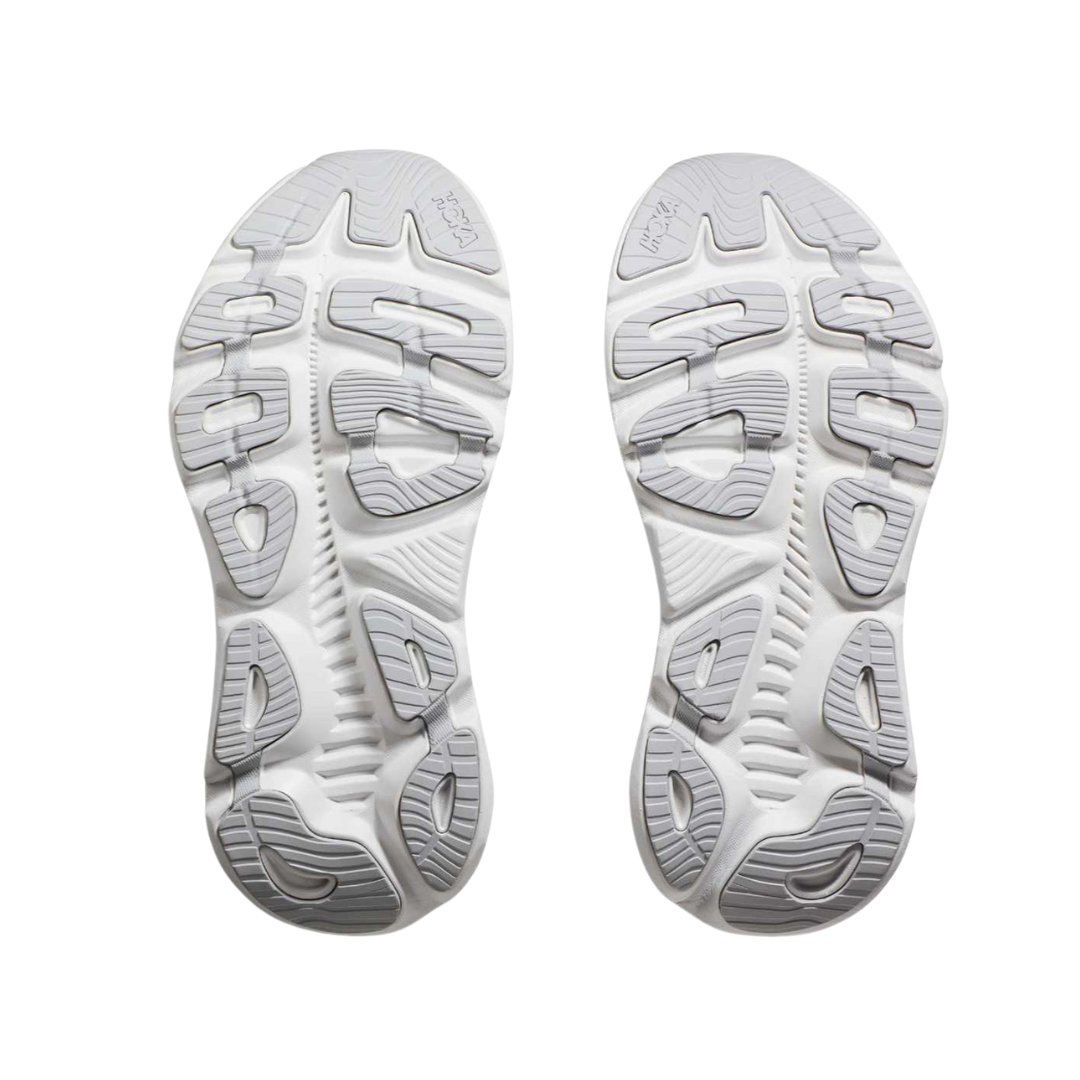Bottom view of Women’s Hoka Gaviota 5 running shoe in harbor mist and rose gold – featuring durable rubber outsole with segmented crash pad for smooth heel-to-toe transition, flex grooves for natural foot movement, and multi-surface traction for versatile grip.
