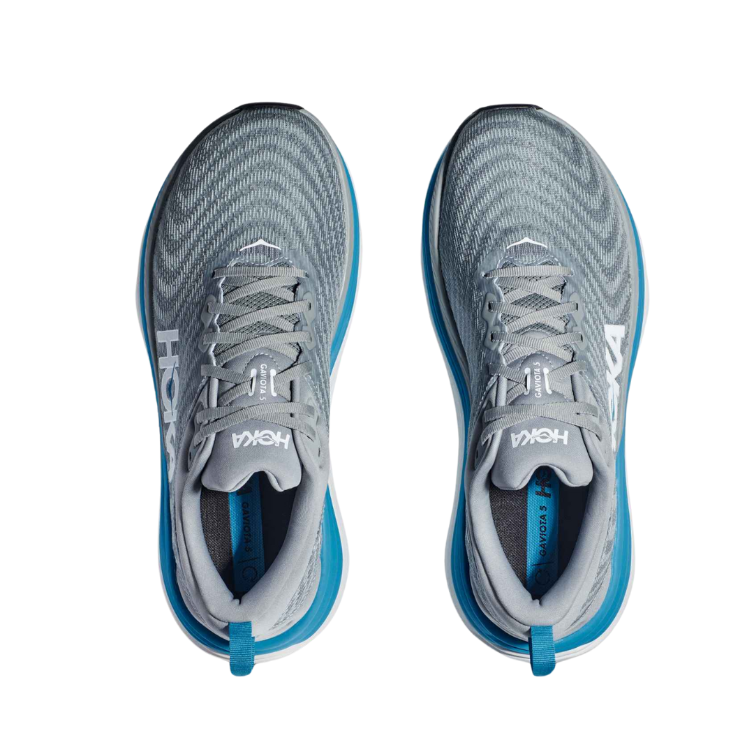 Top view of Men’s Gaviota 5 running shoe in limestone and diva blue – featuring padded tongue and collar for comfort, moisture-wicking lining to keep feet dry, and secure lace-up closure for locked-in fit.