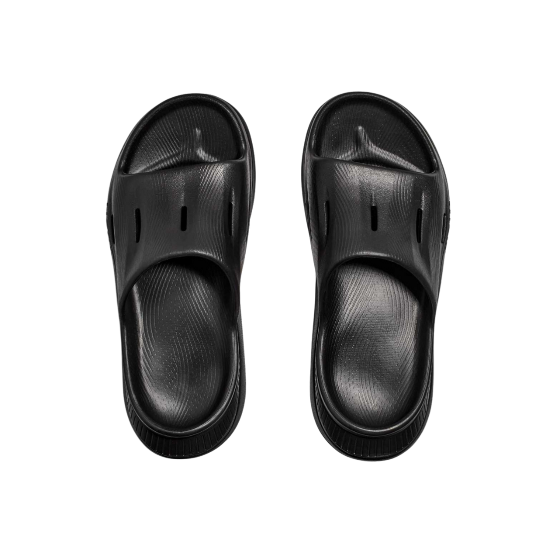 Top view of Unisex Ora Recovery Slide 3 in black – featuring wide strap for secure fit, breathable open design for ventilation, and moisture-wicking materials to keep feet dry and healthy.