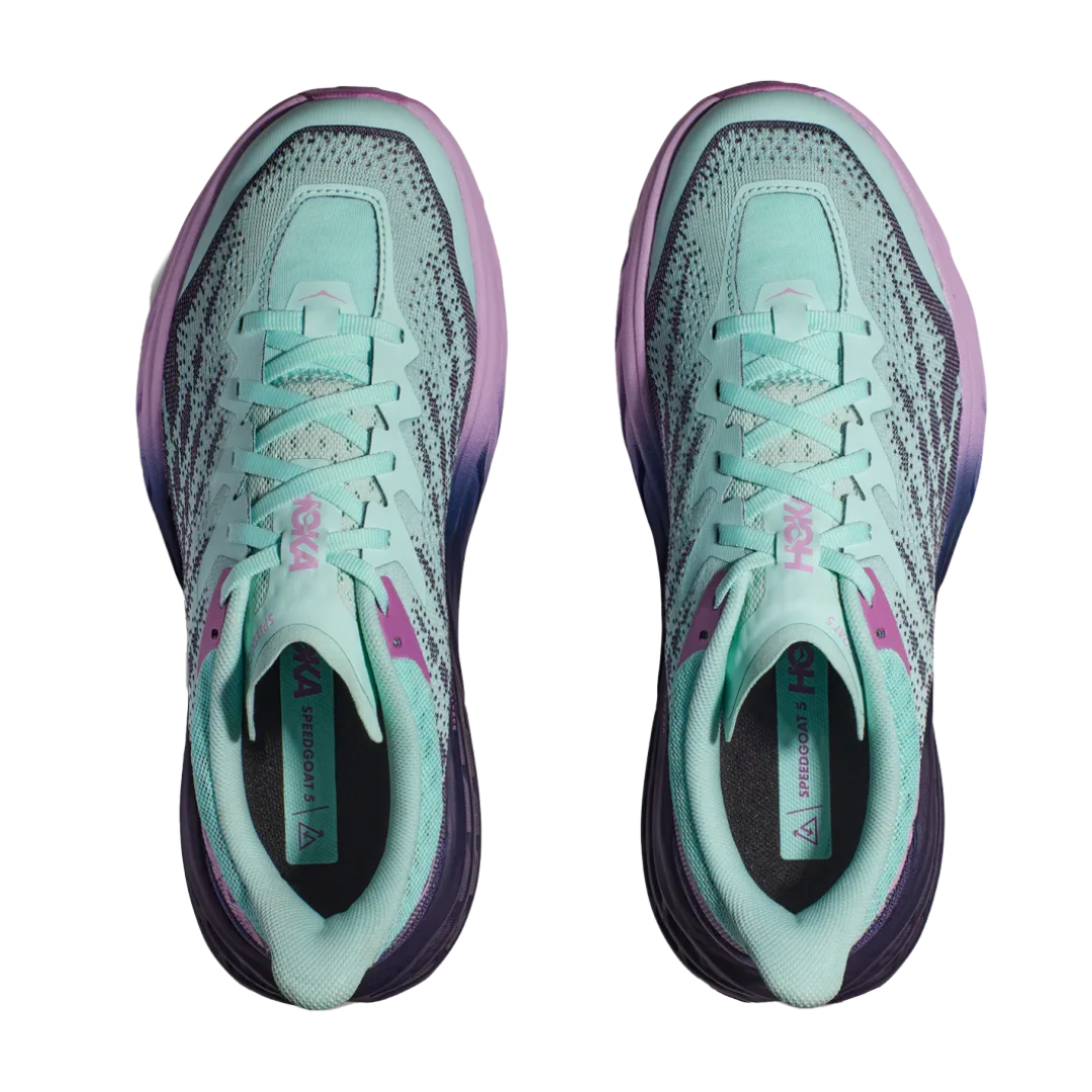 Top view of Women’s Speedgoat 5 trail running shoe in sunlit ocean and night sky – featuring padded tongue and collar for ankle support, moisture-wicking lining to keep feet dry and healthy, and secure lace-up closure for locked-in fit.