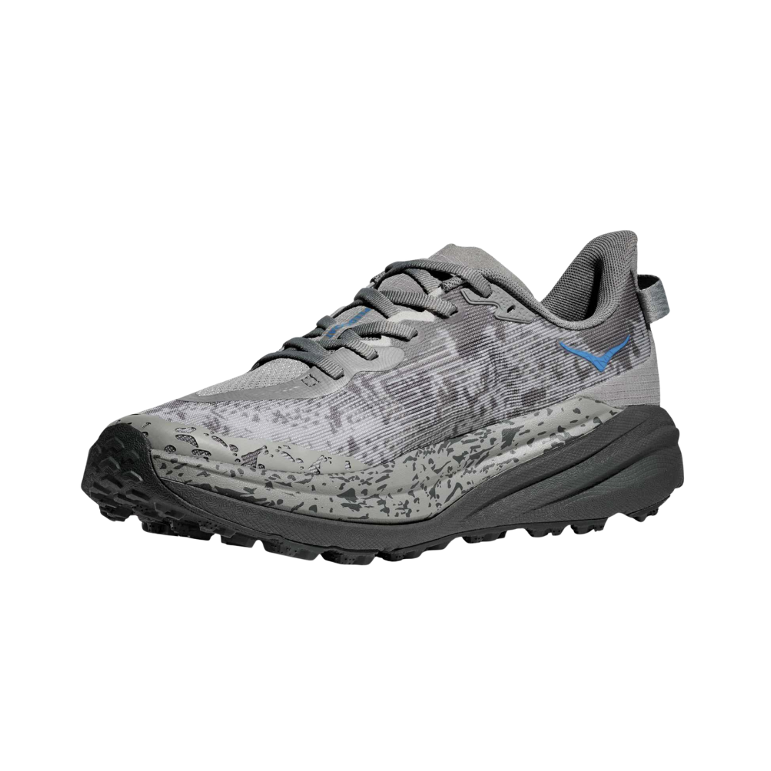 Angled View of Men’s HOKA Speedgoat 6 Trail Running Shoe in Galactic Grey/HOKA Blue – featuring updated streamlined upper, cushioned yet responsive ride, and enhanced traction for challenging surfaces.