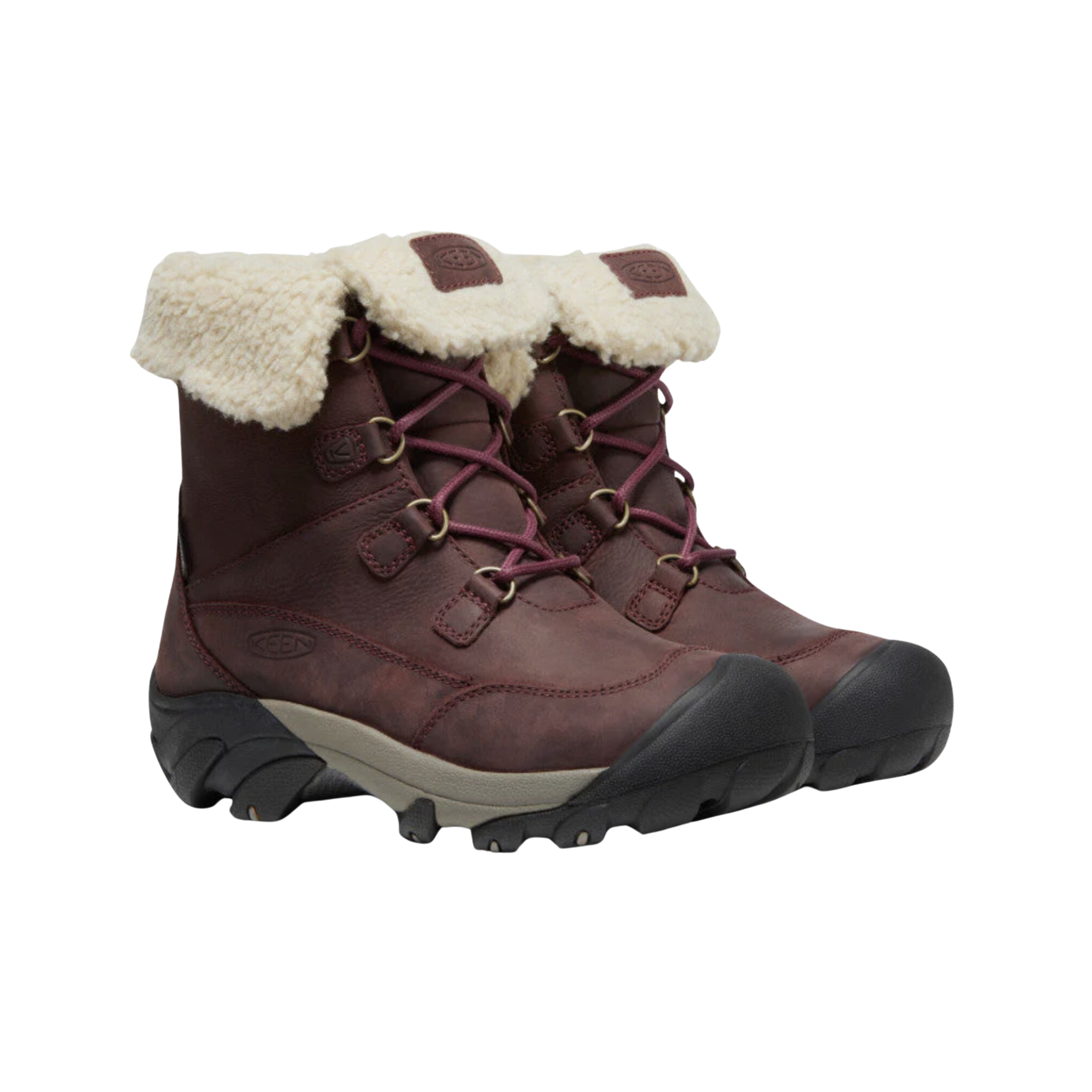 Side view of Women’s Betty Waterproof Short Boot in burgundy and brindle – featuring a waterproof leather and textile upper for protection in wet conditions, KEEN.WARM insulation rated to -25°F for cold weather, and a short boot height for versatile winter wear.