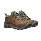 Side view of Women’s Circadia Low Waterproof hiking shoe in syrup and no atlantic – featuring a waterproof nubuck leather and mesh upper for weather protection, cushioned midsole with advanced shock absorption to reduce joint strain, and reinforced toe and heel overlays for durability.