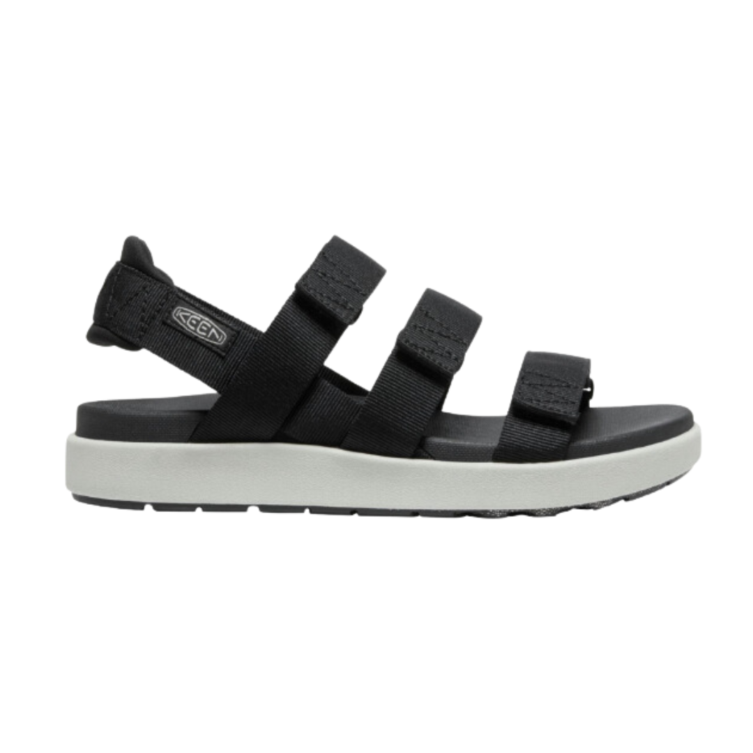Side view of Women’s Elle Strappy sandal in black and vapor – featuring multiple adjustable leather straps for customized fit, cushioned EVA midsole for all-day comfort, and lightweight flexible sole for natural movement.
