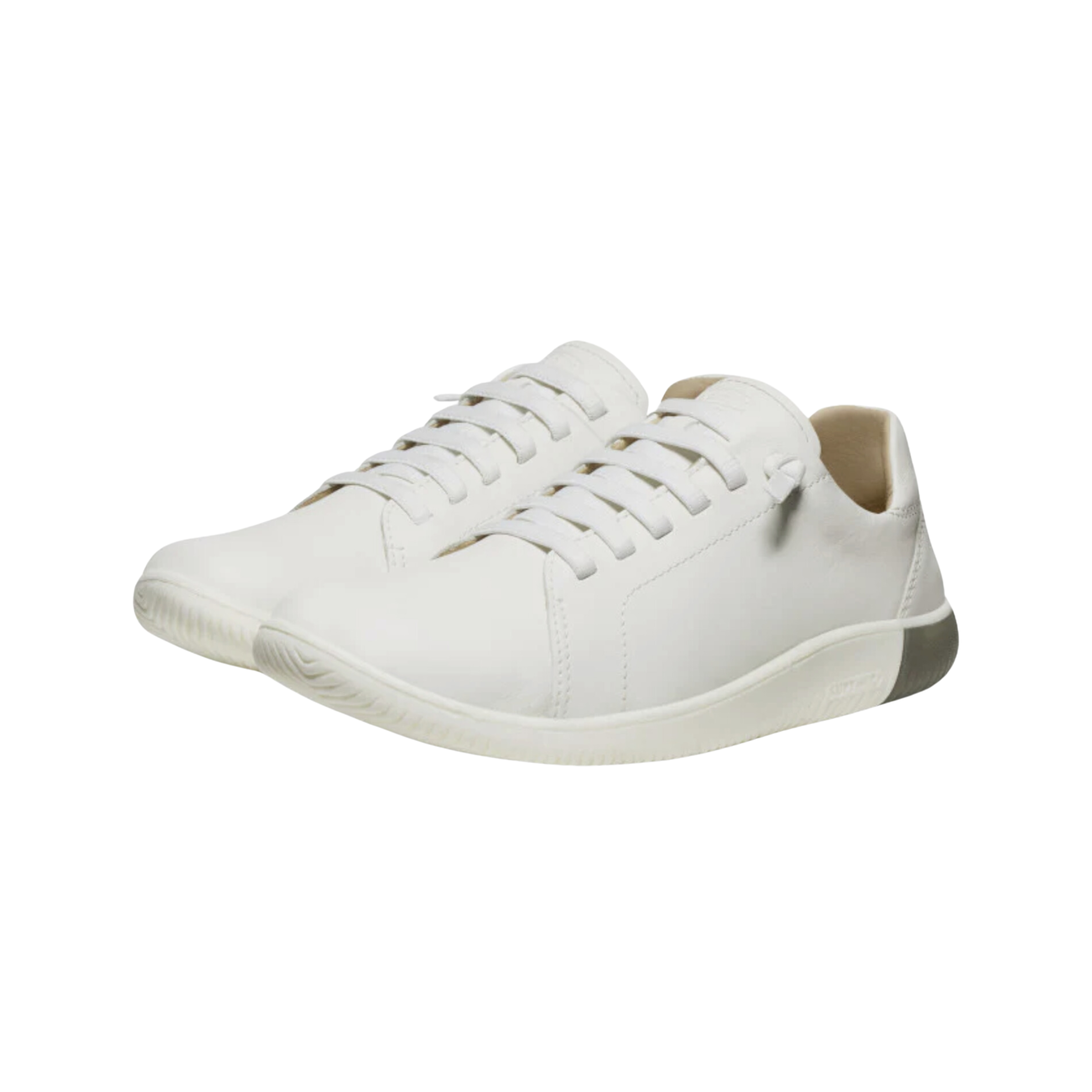 Side view of Men’s KNX Leather Sneaker in star white – featuring a premium full-grain leather upper for durability and sleek style, streamlined low-top silhouette, and cushioned footbed for all-day comfort.
