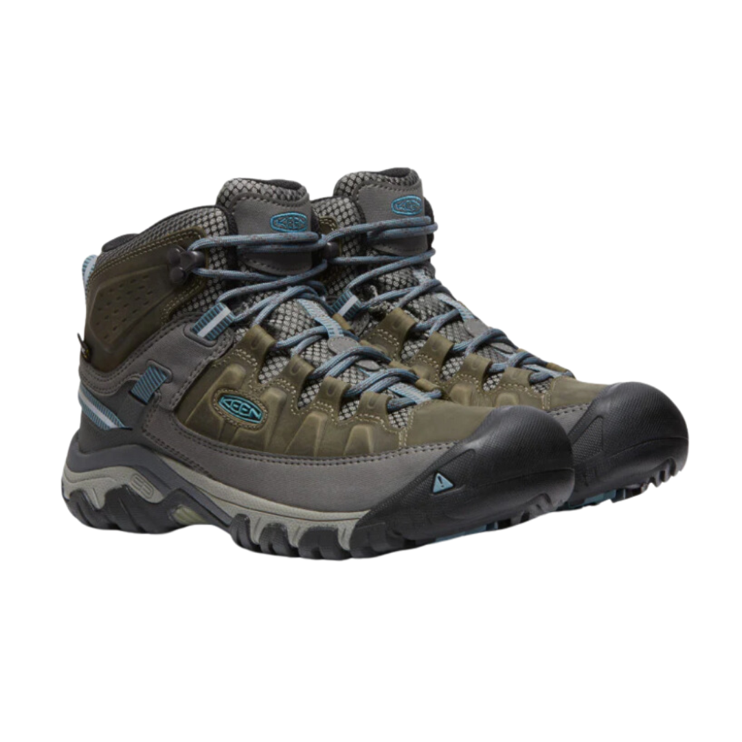 Side view of Women’s Targhee III Mid Boot in magnet and atlantic blue – featuring a waterproof nubuck leather upper with breathable mesh panels, cushioned midsole for all-day hiking comfort, and reinforced toe and heel overlays for durability.