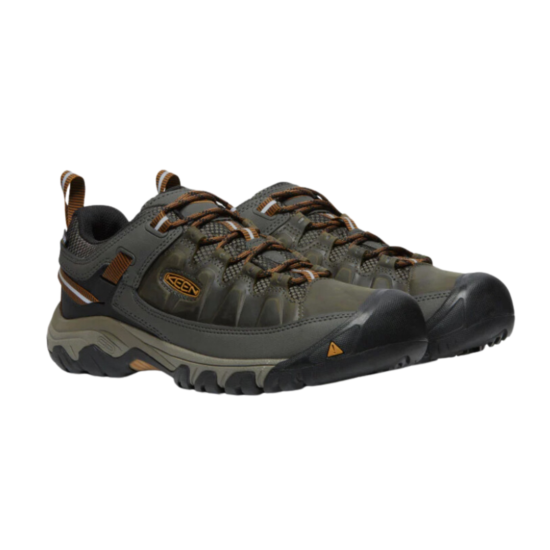 Side view of Men’s Targhee III Waterproof hiking boot in black olive and golden brown – featuring a waterproof nubuck leather upper, breathable mesh panels for ventilation, and cushioned midsole for all-day hiking comfort.