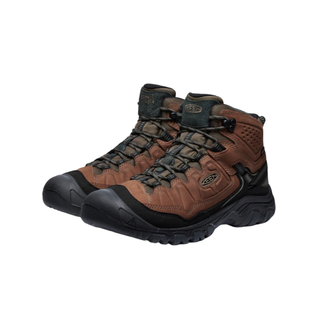 Side view of Men’s Targhee IV Mid Waterproof Boot in bison and black – featuring a waterproof nubuck leather upper with breathable mesh panels, cushioned midsole for all-day comfort, and reinforced toe and heel overlays for durability.