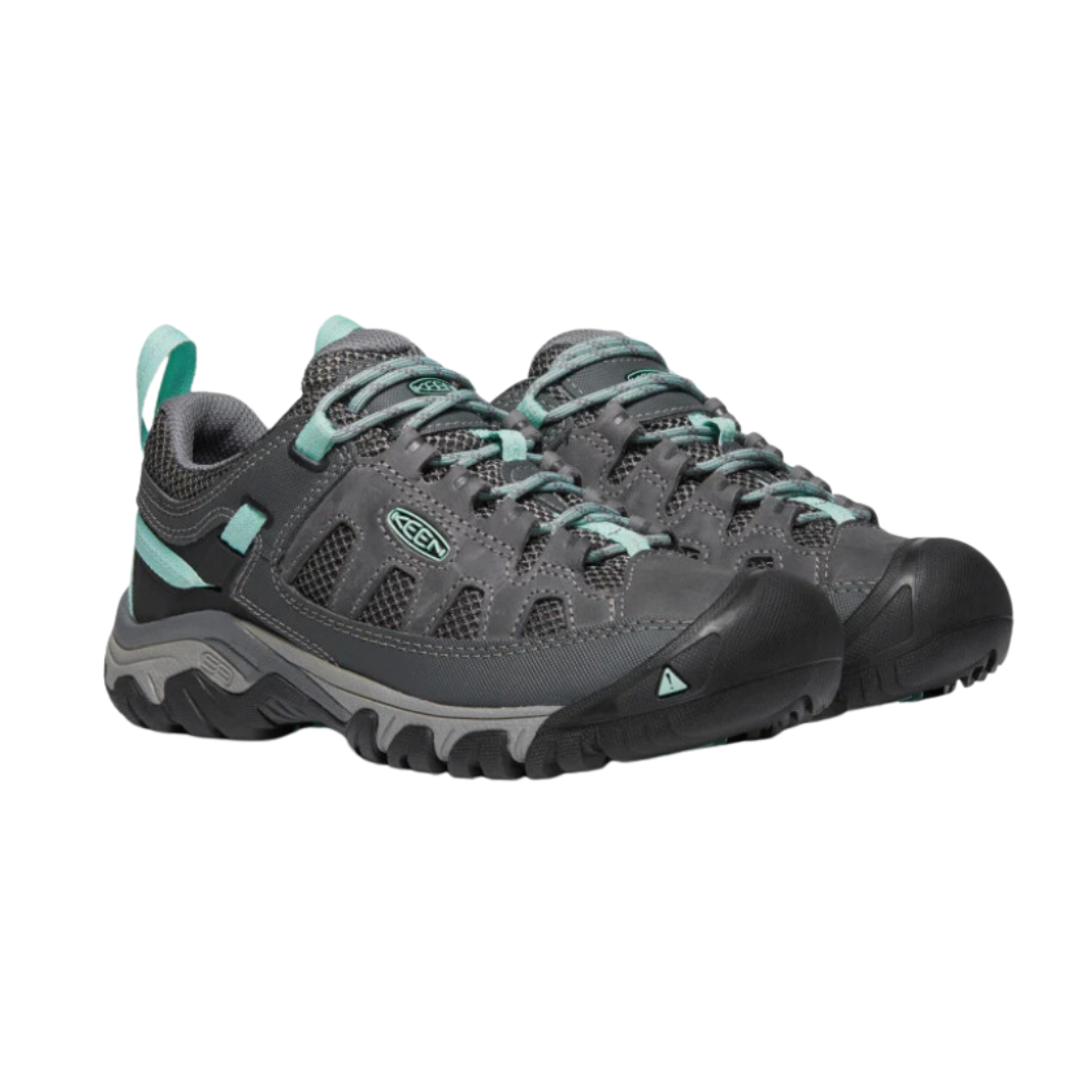 Side view of Women’s Targhee Vent hiking shoe in steel grey and ocean wave – featuring a breathable mesh upper with durable synthetic overlays for lightweight support, cushioned midsole for long-lasting comfort, and protective toe cap for trail durability.