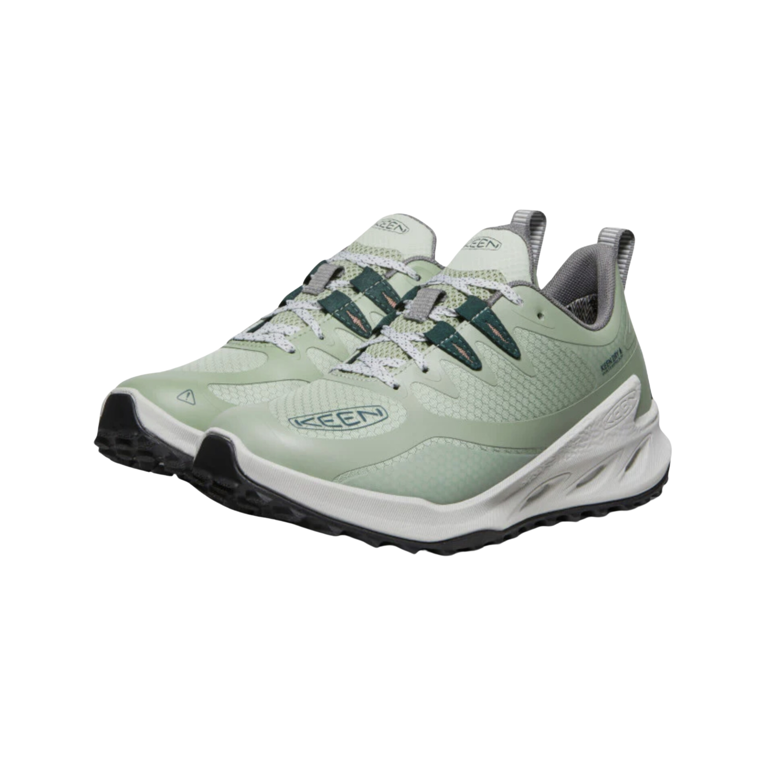 Side view of Keen Women's Zionic Waterproof Hiking Shoe in Desert Sage/Ember Glow – featuring a waterproof upper with strategic reinforcement, cushioned midsole, and a trail-ready outsole with dynamic grip, ideal for long hikes and rugged conditions.