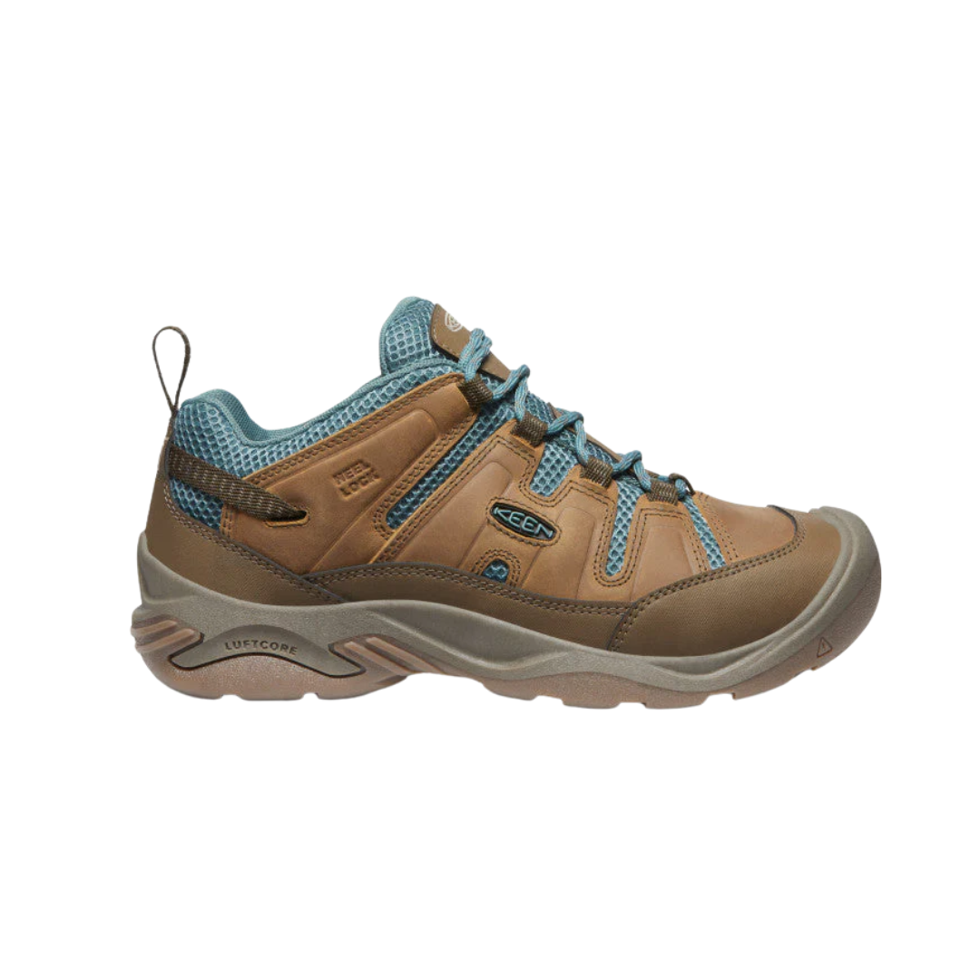 Side view of Women’s Circadia Vent hiking shoe in coconut and north atlantic – featuring a breathable mesh upper with synthetic overlays for lightweight support, cushioned midsole with advanced shock absorption to minimize joint stress, and reinforced toe cap for trail protection.