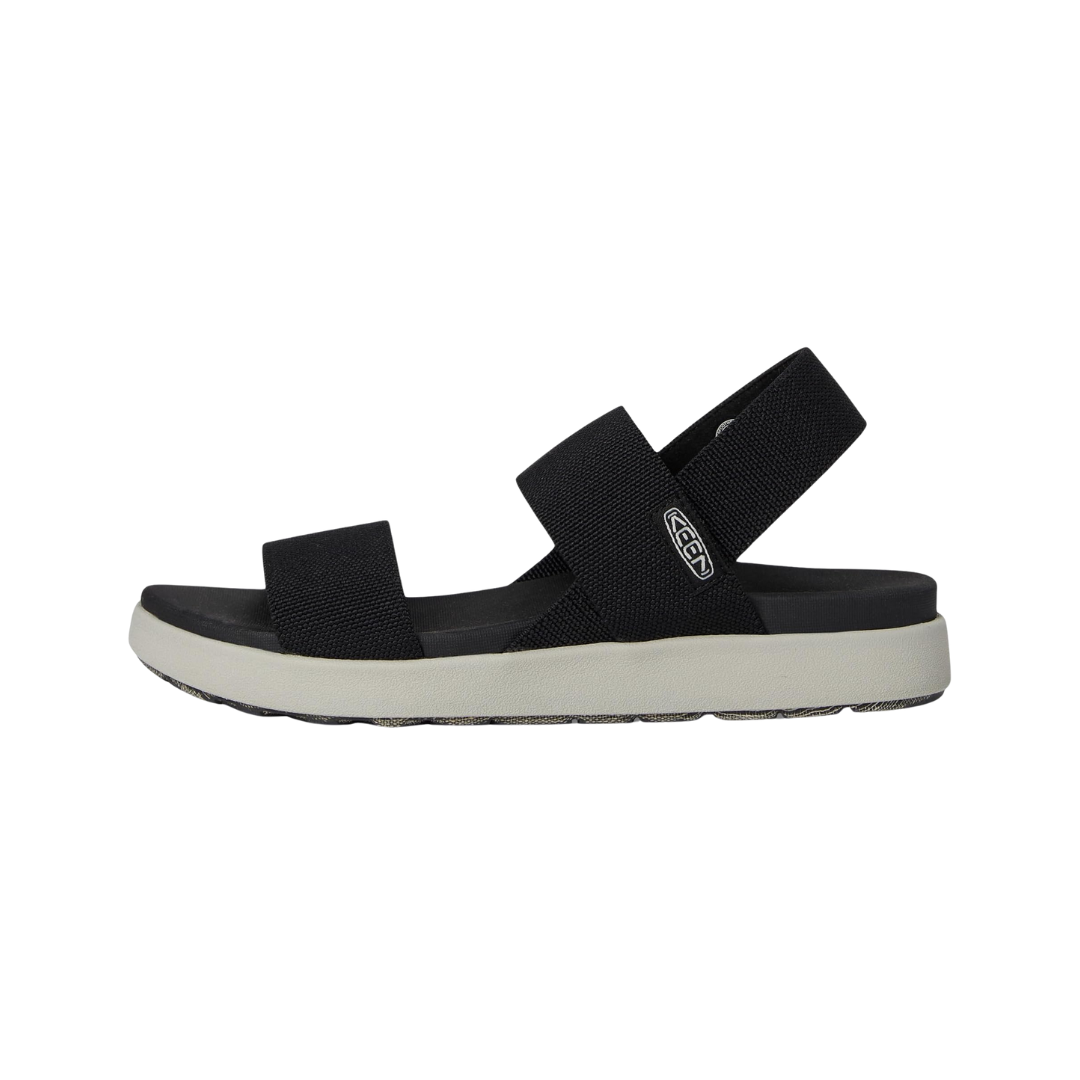 Side view of Women’s Elle Strappy sandal in black and vapor – featuring multiple adjustable leather straps for customized fit, cushioned EVA midsole for all-day comfort, and lightweight flexible sole for natural movement.