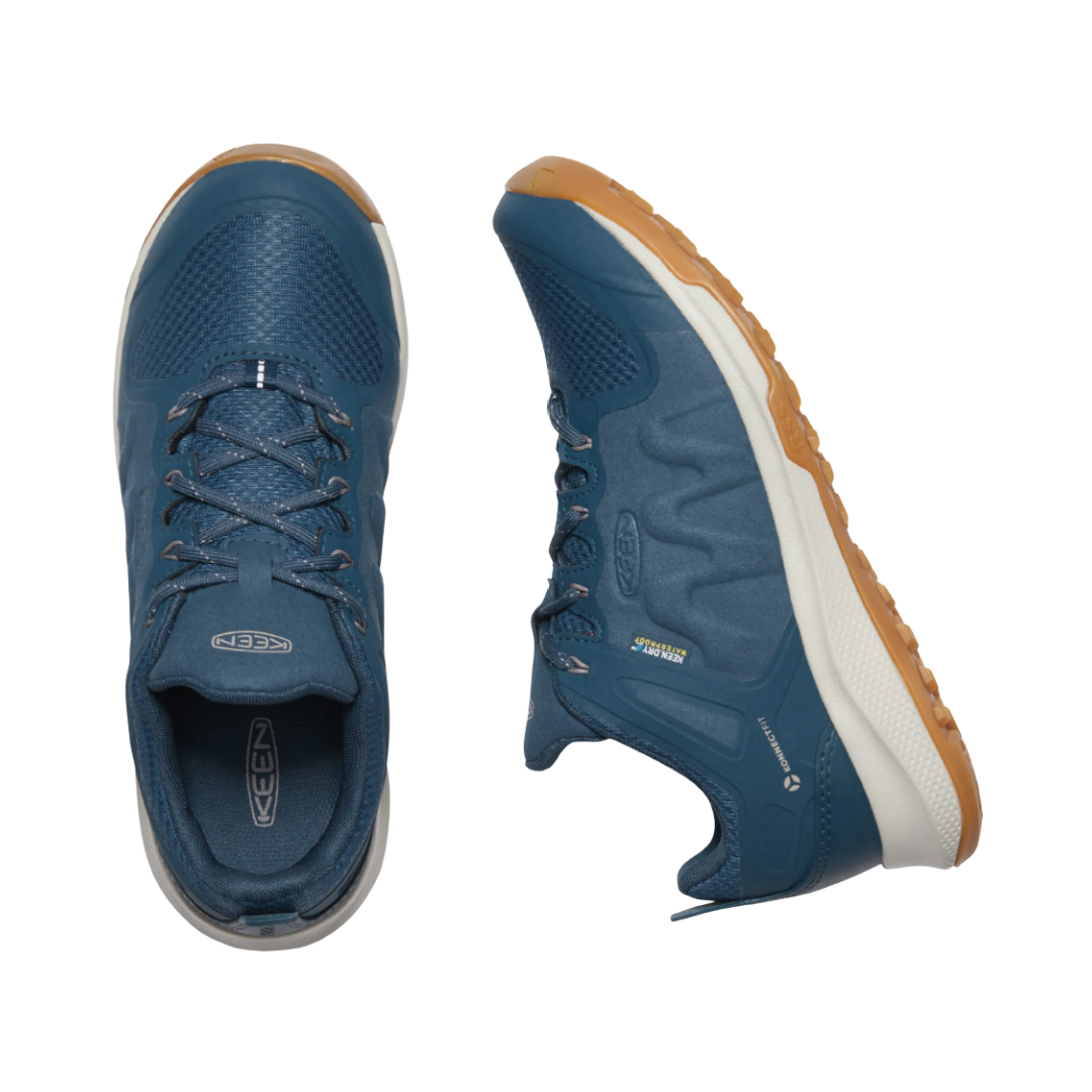 Top and Side View of Women’s Keen Explore Waterproof Hiker boot in majolica blue/satellite – featuring a waterproof leather and mesh upper, secure lace-up closure, padded collar and tongue for comfort, and a supportive cushioned midsole designed for all-day hiking stability.