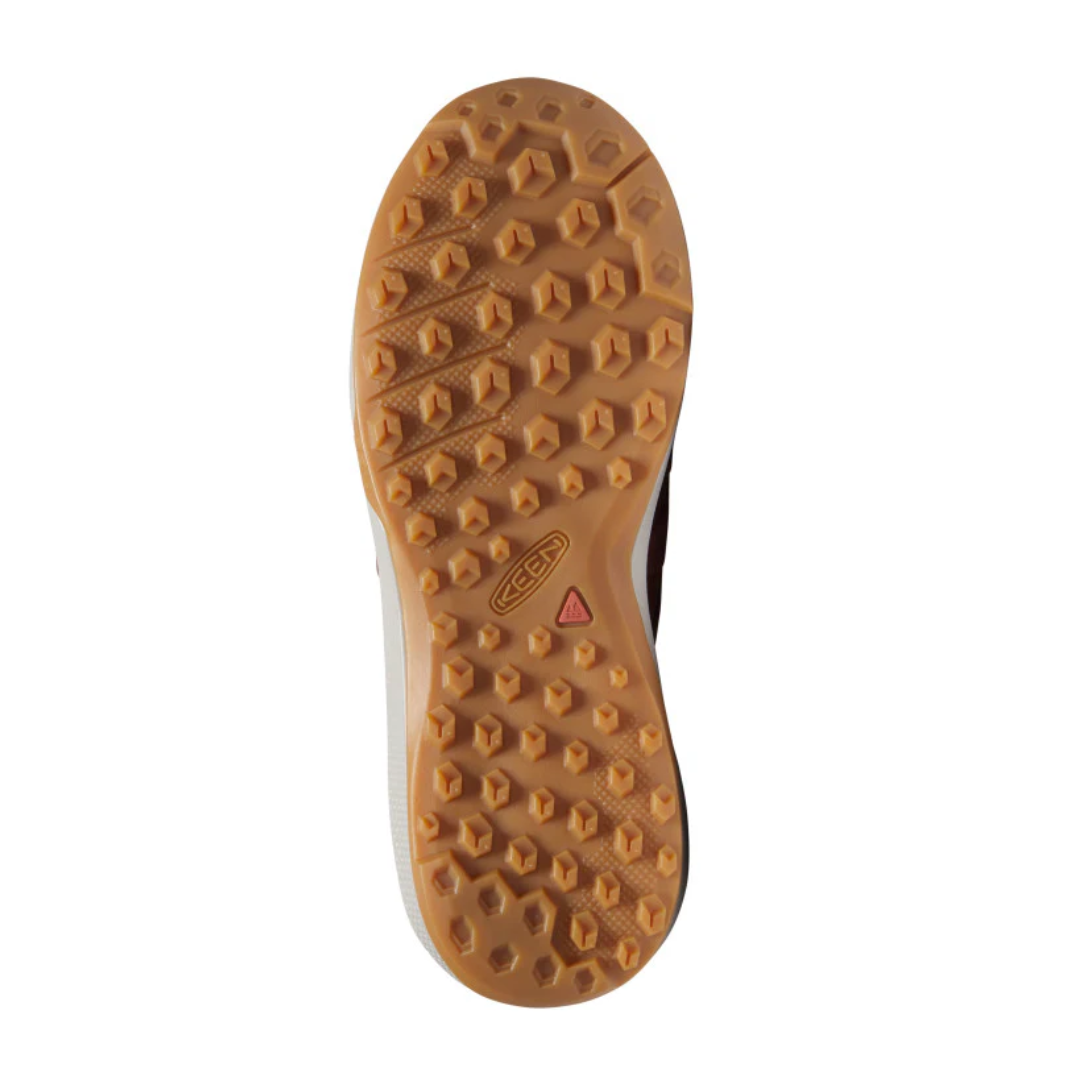 Bottom view of Women’s Explore Waterproof Hiking Shoe in tawny port and satellite – featuring a rugged rubber outsole with multi-directional lugs for reliable traction on varied terrain, flex grooves for natural foot movement, and heel brake zone for controlled descents.