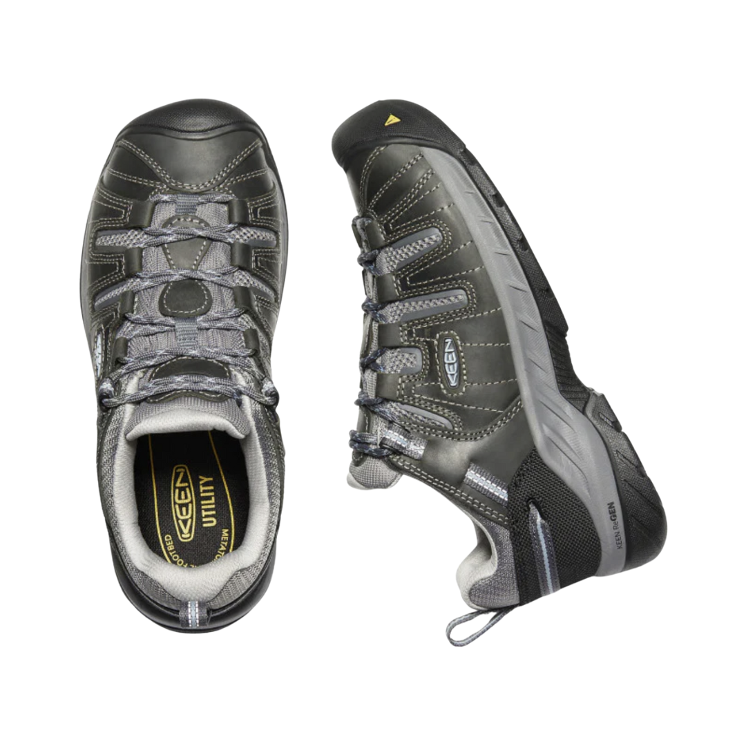 Top and Side View of Women’s Keen Flint II Soft Toe Shoe in steel grey/paloma – featuring a breathable mesh and leather upper, secure lace-up closure, padded collar and tongue for comfort, and a cushioned midsole for all-day support.