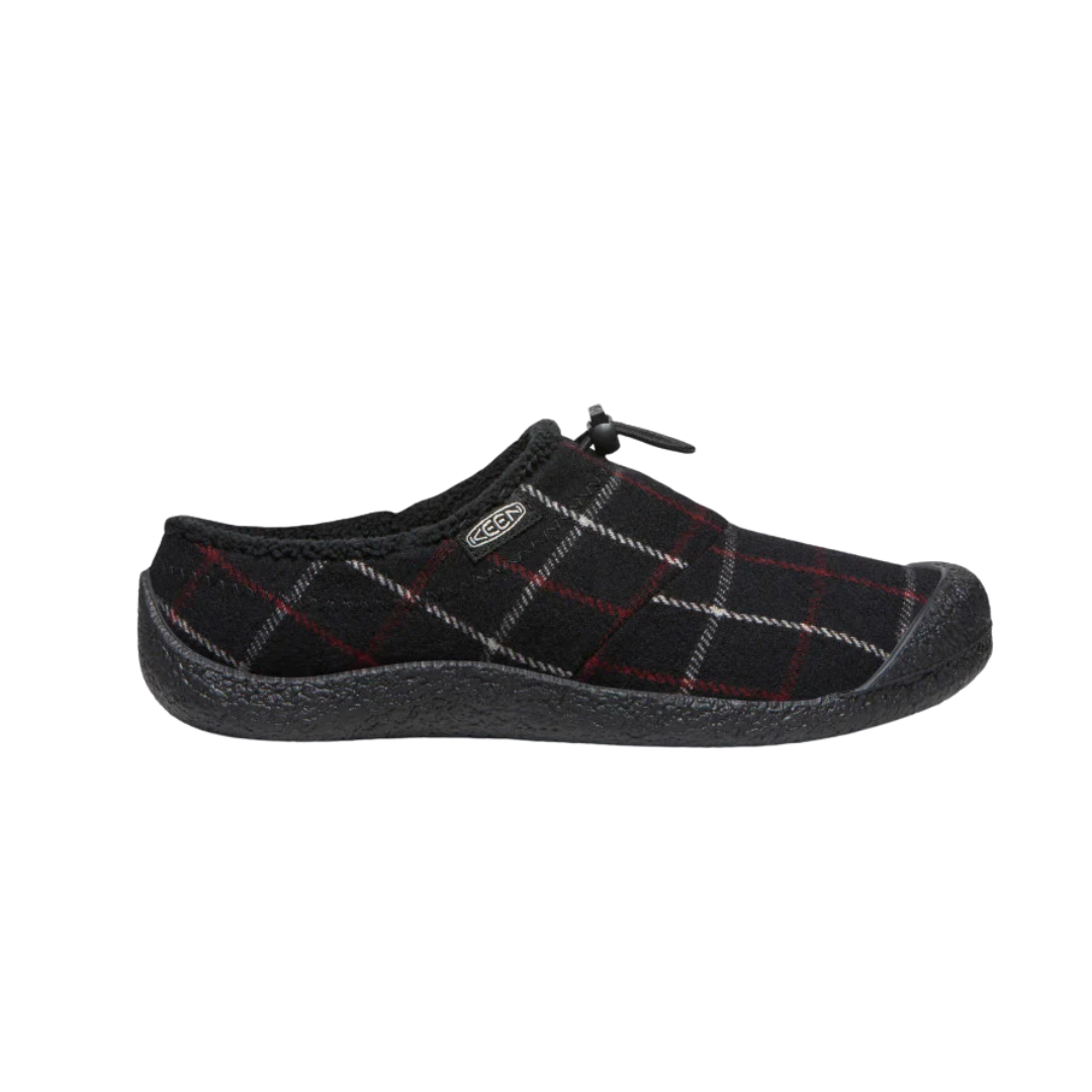 Side view of Women’s Howser III Slide in black plaid – featuring a quilted textile upper for lightweight insulation, soft fleece lining for warmth, and slip-on design with a collapsible heel for versatile wear.