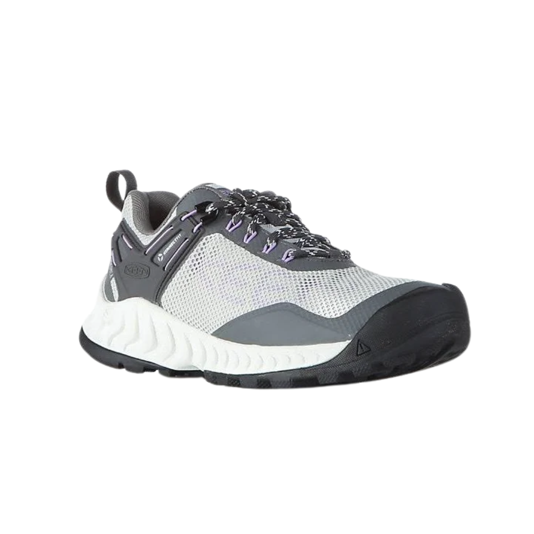 Angled view of Women’s NXIS Evo Waterproof shoe in steel grey and English lavender – featuring a breathable, lightweight construction ideal for fast hiking, high-rebound midsole for long-distance cushioning, and a sporty silhouette built for dynamic movement.
