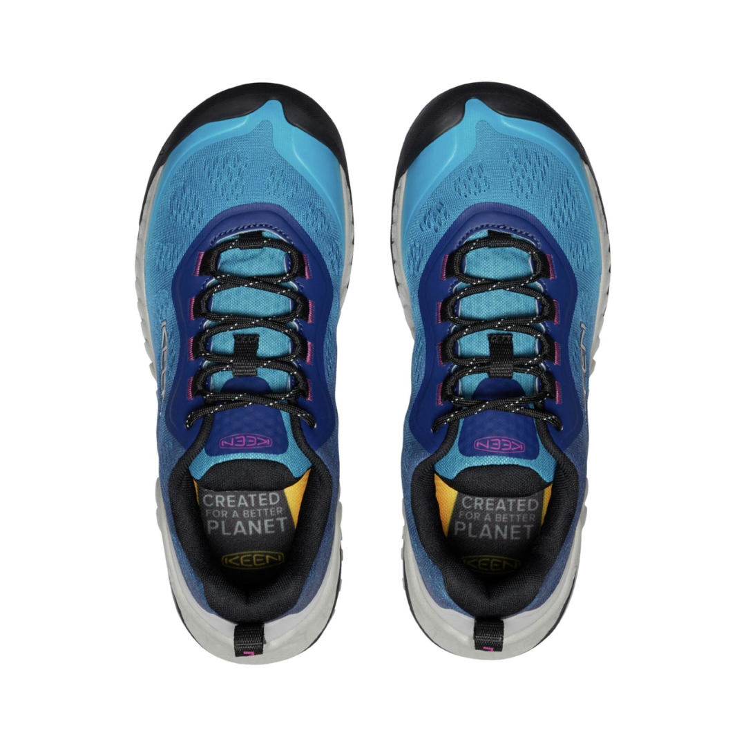 Top view of Women’s Nxis Speed Hiking Shoe in fjord blue and ombre – featuring a padded collar and tongue for comfort, moisture-wicking lining for dry feet, and secure lace-up closure with reinforced eyelets for a locked-in fit.