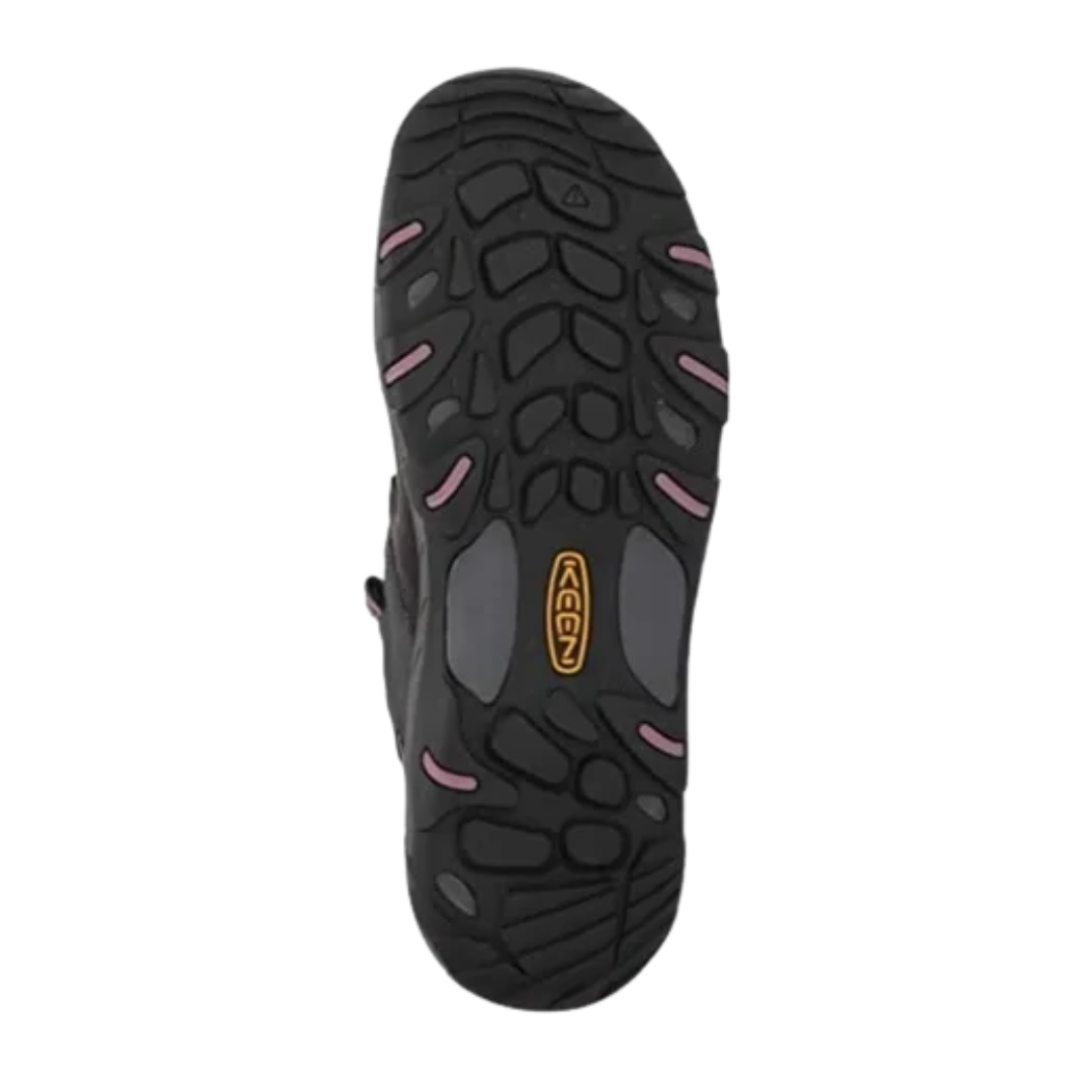 Bottom view of Women’s Steens Vent hiking shoe in magnet and nostalgia rose – featuring a non-marking rubber outsole with multi-directional lugs for grip on varied terrain, shallow tread for everyday traction, and flexible sole for natural movement.